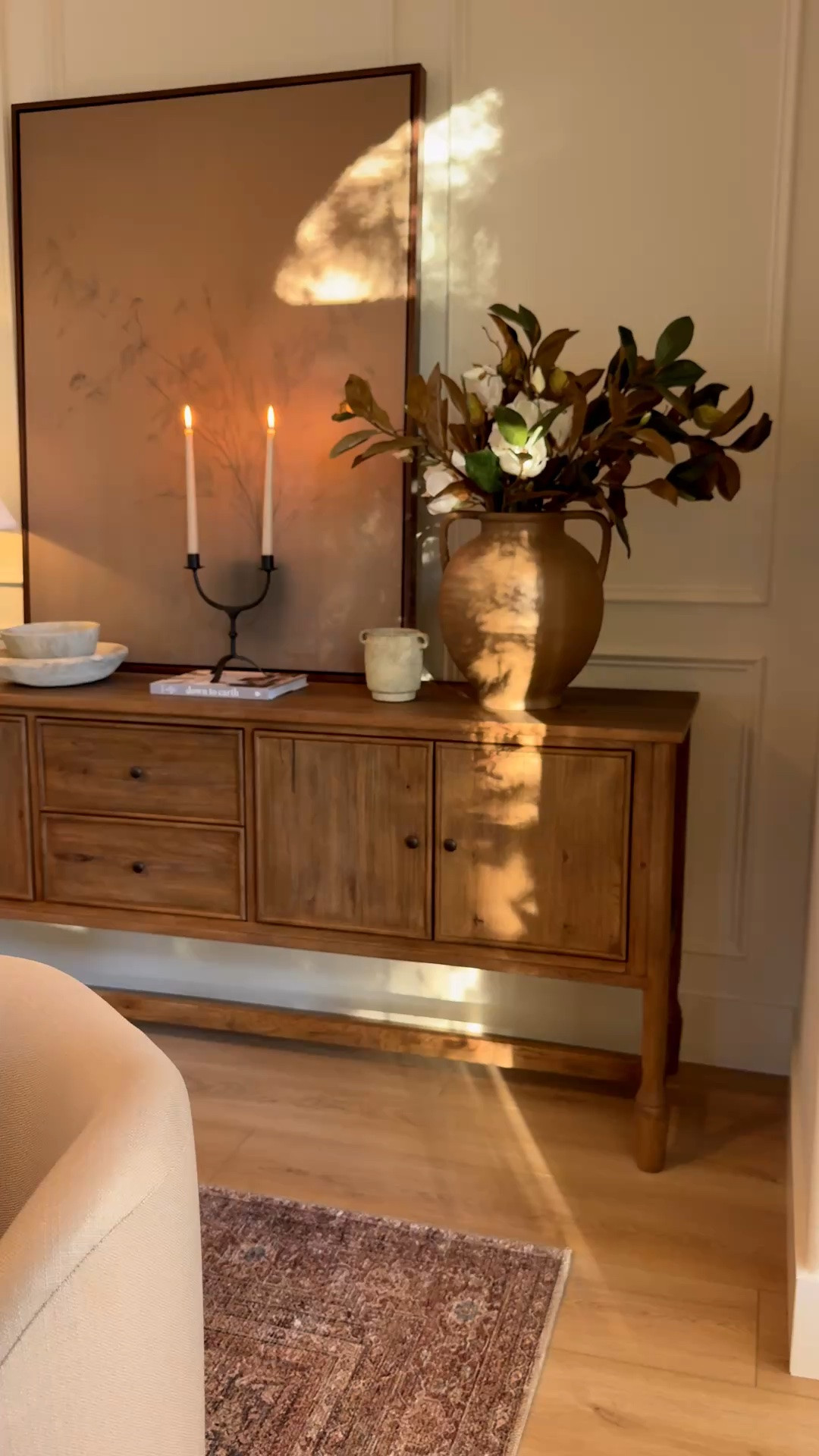 Golden hour in the dining room ✨

Sideboard decor, dining room furniture, dining chairs, dining table, vintage style area rug, organic modern decor, timeless decor, vase, stems, candle holder, wall art, table lamp.

#LTKHome #LTKSeasonal #LTKU