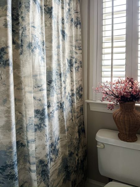 A lot of showers these days are moving to glass enclosures, which I understand as we've done it too in our home. But we have one room that still needs a curtain. It's the shower/bath in the girls' bathroom it's so sweet to infuse life into that room with a curtain.

#LTKSeasonal #LTKhome #LTKstyletip