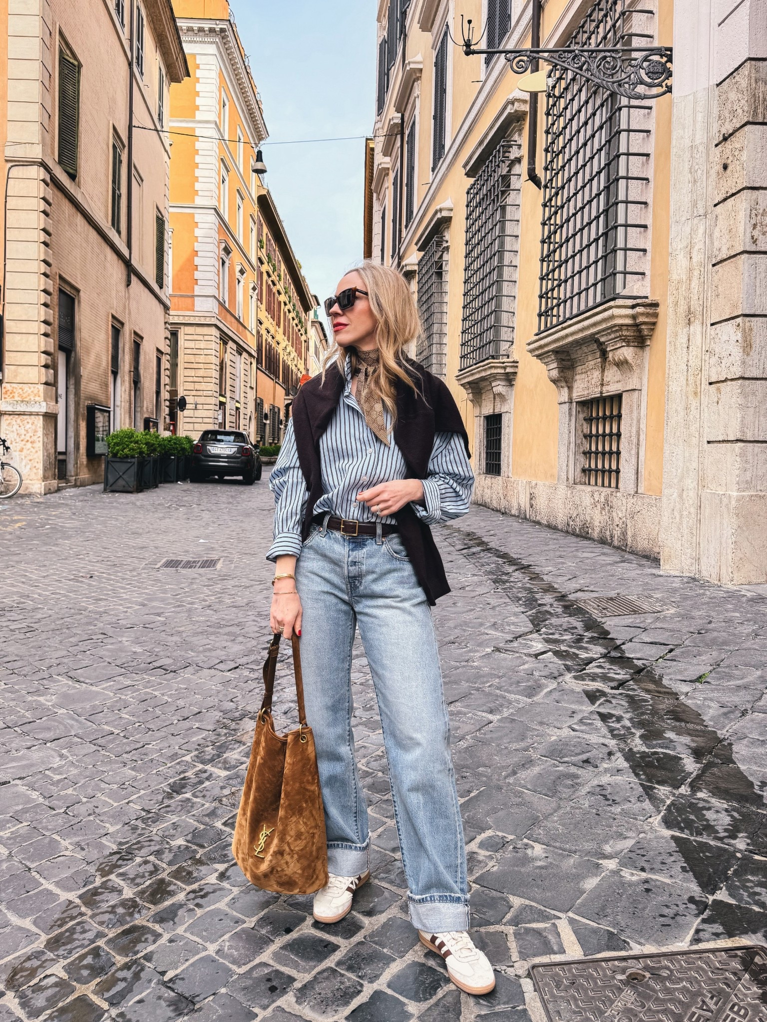 Spring outfit, travel style, European vacation, @Zara striped shirt, @Levi's baggy 90’s jeans, Adidas Samba sneakers, suede YSL bucket bag

#LTKOver40 #LTKSeasonal #LTKTravel