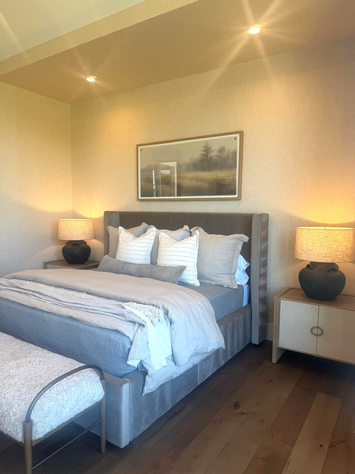 I layered this bedroom with soft, neutral pieces that keep the space feeling calm and balanced. The upholstered bed, textured bedding, and warm table lamps work together to create a comfortable, lived-in look that still feels clean and refined.

I tend to choose pieces that add warmth without adding visual noise, especially in a bedroom. Sharing the furniture, lighting, and bedding I used here below if you’re creating a space that feels simple, quiet, and easy to unwind in.
 @Wayfair 
@Target 
@Lulu and Georgia 
@@Amazon

#LTKSaleAlert #LTKU #LTKHome