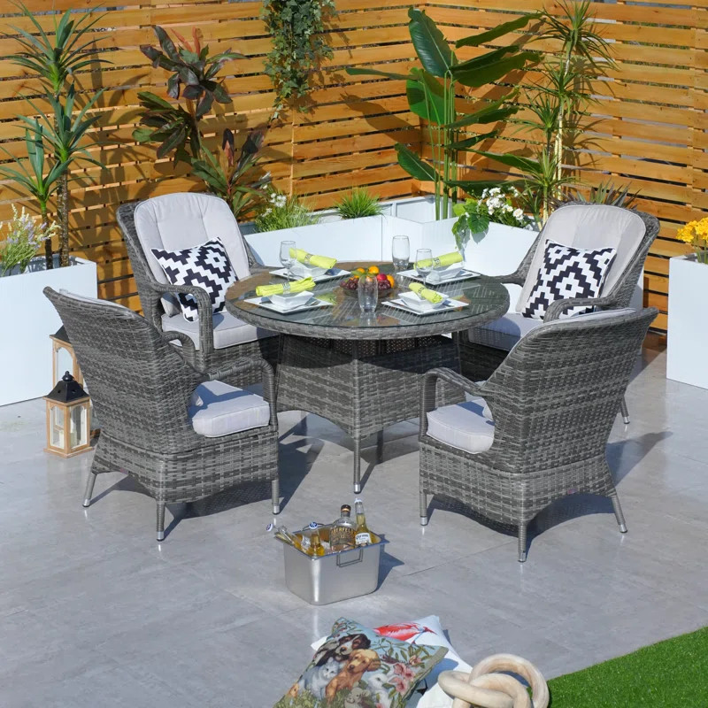 Anikha 4 - Person Round Outdoor Dining Set with Cushions | Wayfair North America