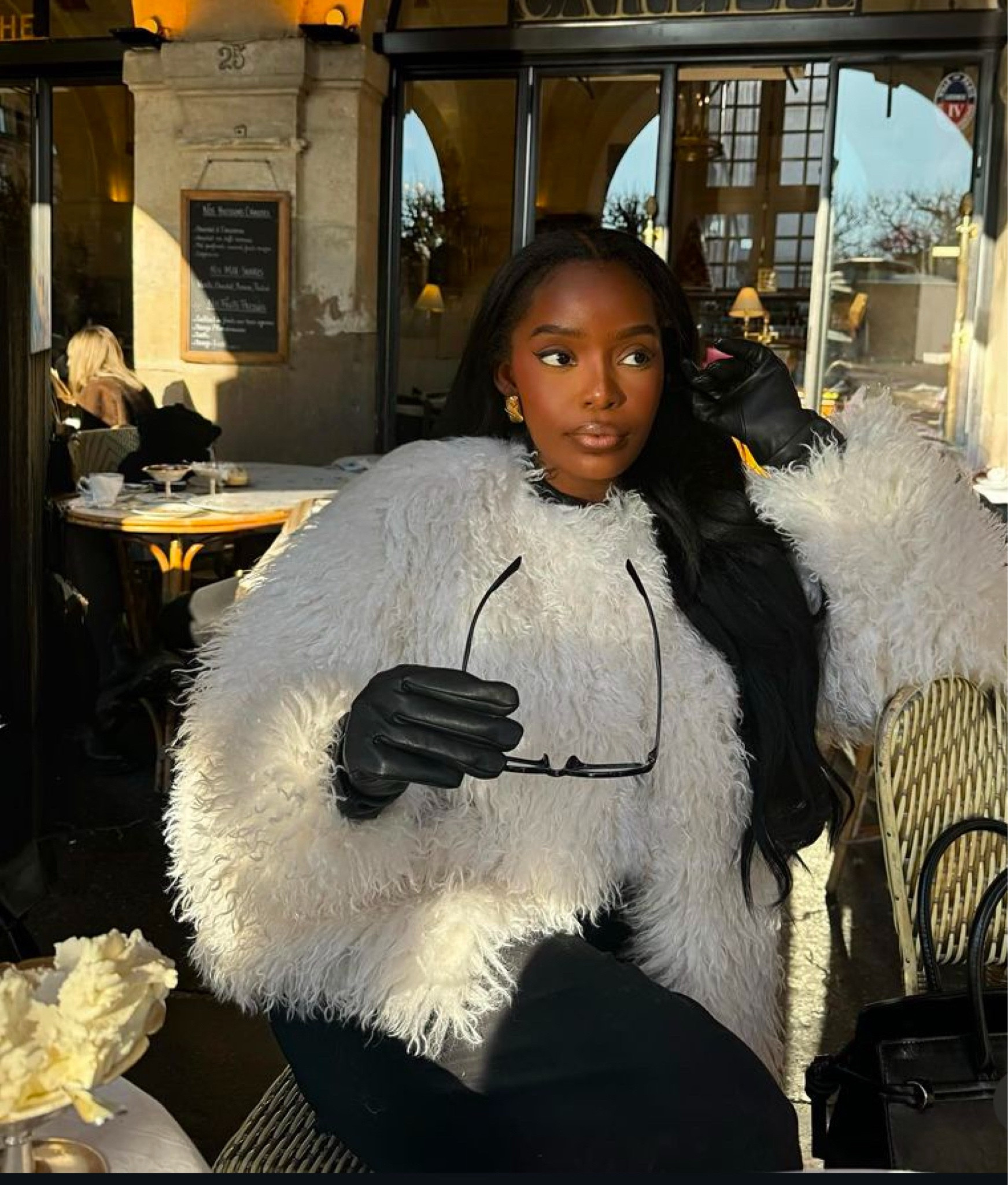 White fur jacket 
Black dress black leather gloves 

#LTKMostLoved #LTKPetite #LTKStyleTip