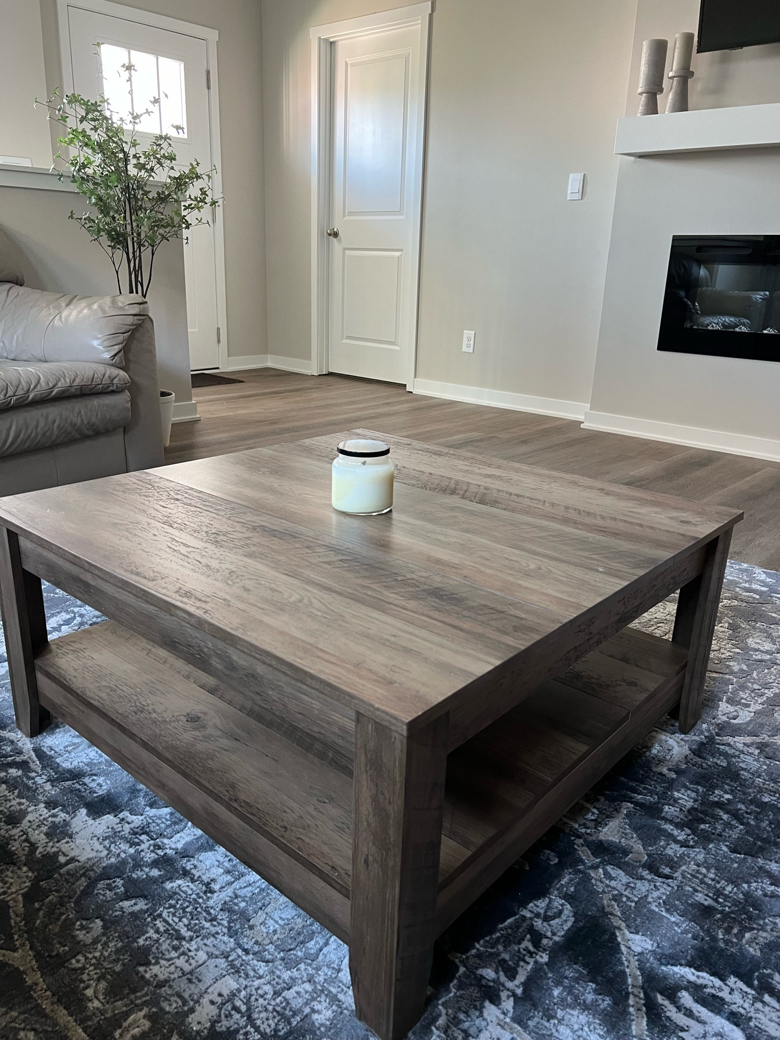 I love how our living room is coming together, especially with the addition of this coffee table!

Living room, living room design, coffee table, square coffee table, minimalist style, clean design, dark rug, mantle candles, faux potted tree

#LTKHome