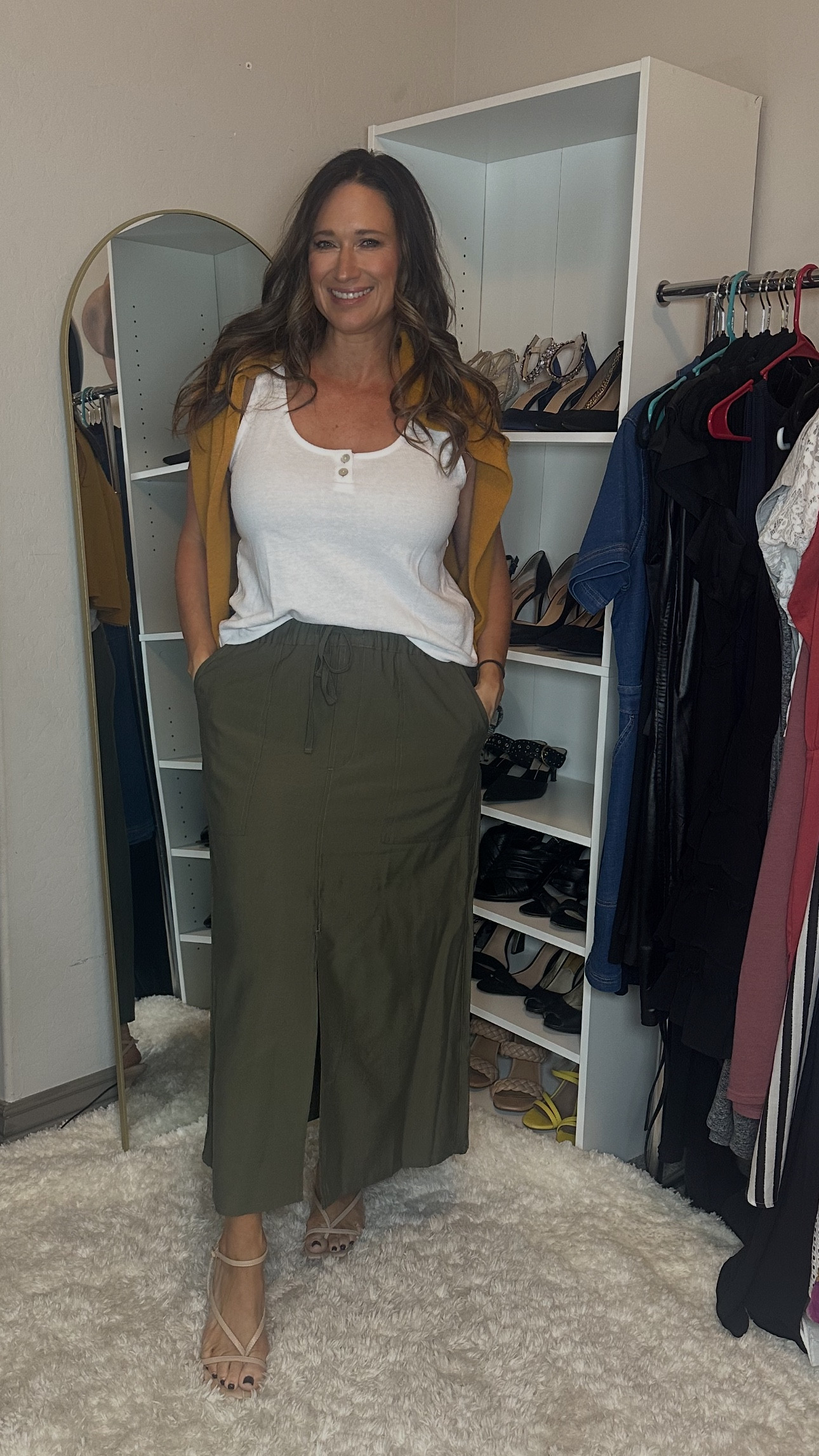 Wearing a lrg in the skirt and tank, and a medium in the sweater. The heels are from Amazon and are super comfortable! 

#LTKMidsize #LTKStyleTip #LTKFindsUnder50