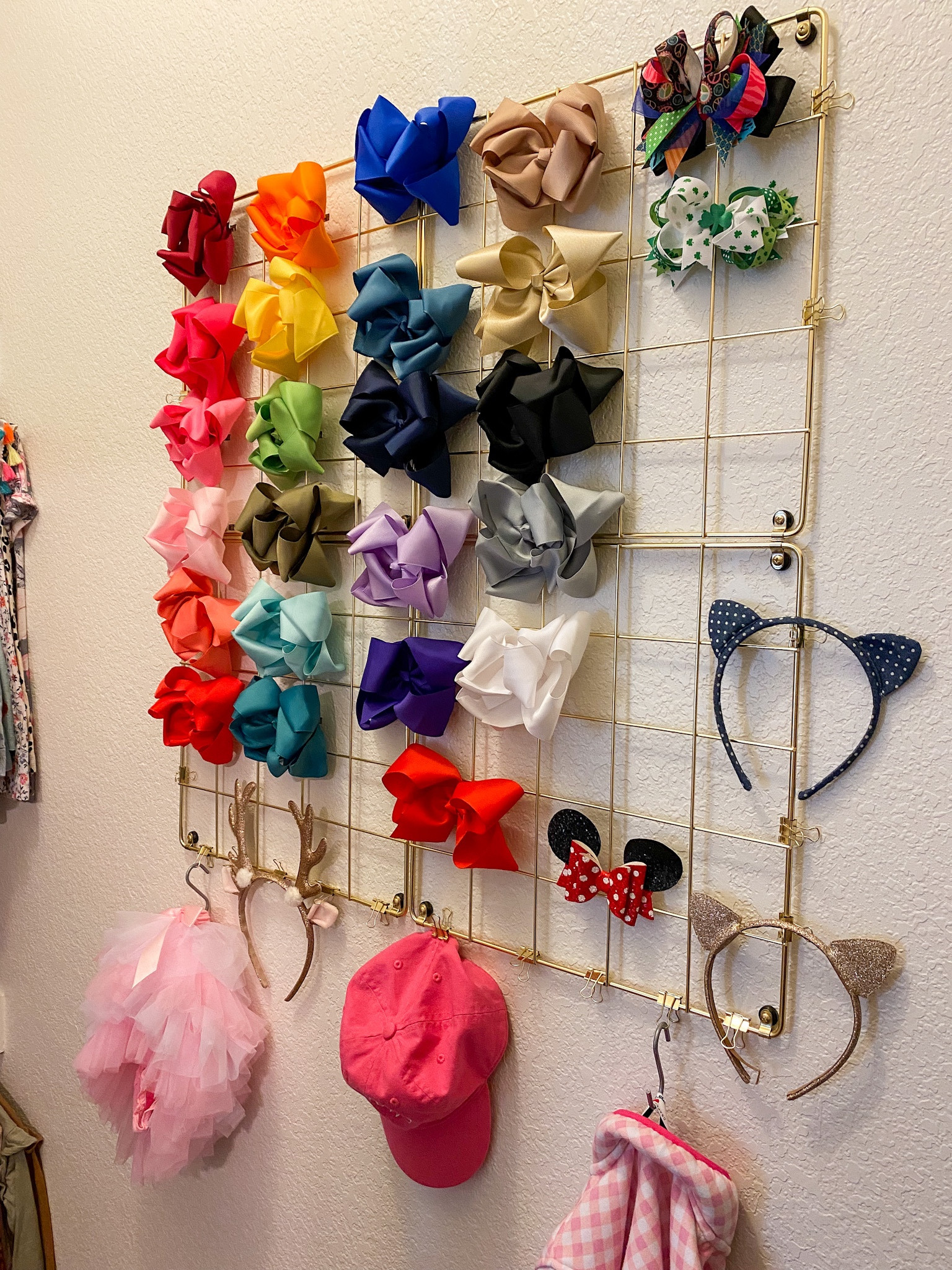 With 3 little girls, you know we’ve got LOTS of bows over here! 

In this photo I’ve got 4 of the wire grids all hung together. We added a spacer with each screw so the grids are lifted off the wall a little bit for the hair bows to be able to clip onto the grid without hitting the wall (so 4 spacers per grid = 16 spacers total). I added S-hooks at the bottom to hold bags, hats, headbands, etc.

I LOVE this bow organization system! It works so well for us and all of our bows!

#LTKkids #LTKstyletip #LTKBacktoSchool