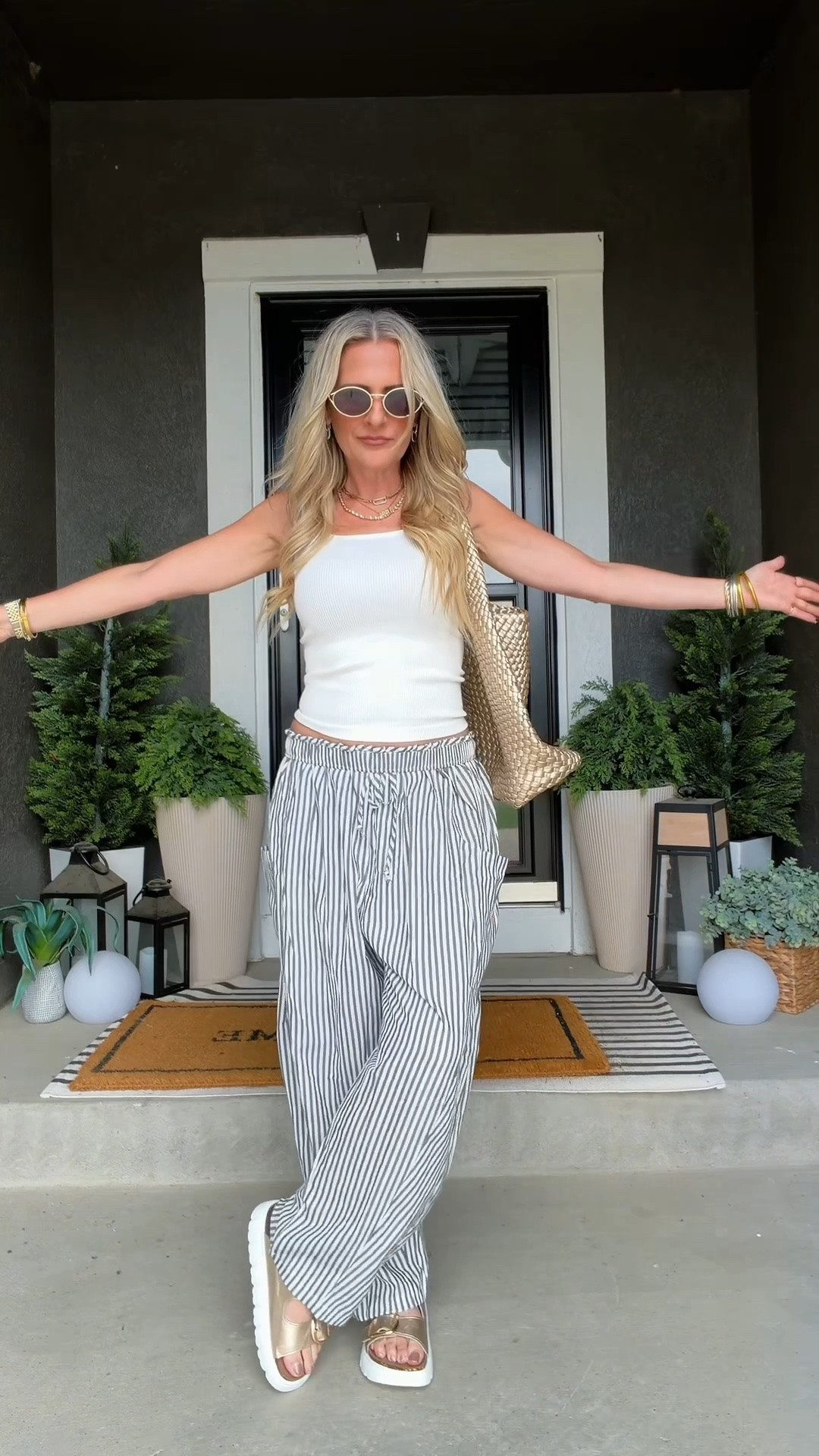 Petite-friendly summer outfit with baggy drawstring pants, two-strap sandals, and an oversized top. I love outfits that feel relaxed without swallowing a petite frame, and this combination gets it just right. Easy, comfortable, and one of those looks you’ll reach for all season long.

#LTKOver40 #LTKmomlife #LTKootd