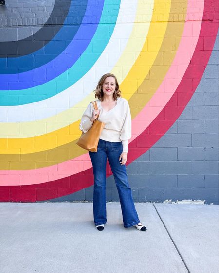#ExpressPartner Sweaters are fun and feminine for the fall. I’m all about pairing this v-neck relaxed top with mid rise dark wash pocket 70s flare jeans — both from @express #ExpressYou #September2022
.
.
.
.
#theeverygirl #theglennygirl #darling #mural #fallfashion #streetstyle #theglennygirl #southernblogger #liketoknowit #kybloggers #lexington#everydayblogger #darling #ootd #kentuckyblogger #fashionist 

#LTKSeasonal #LTKsalealert