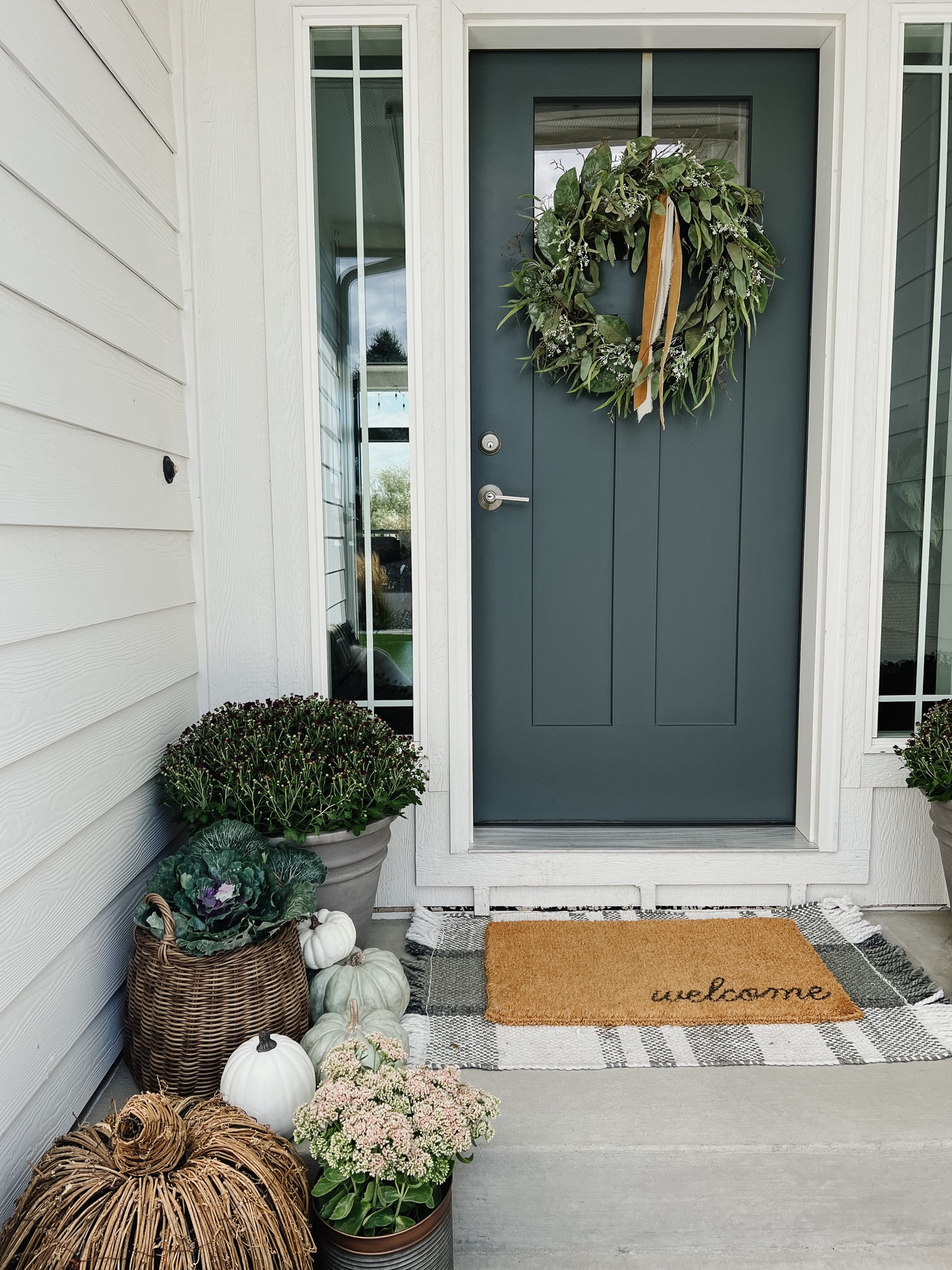 Fall porches are so fun! Pulled out all of my faux things and added some mums from Costco. 

Fall porch, entry, faux cabbages, foliage, pumpkins, autumn, wreath, McGee and Co, Kirklands, Target