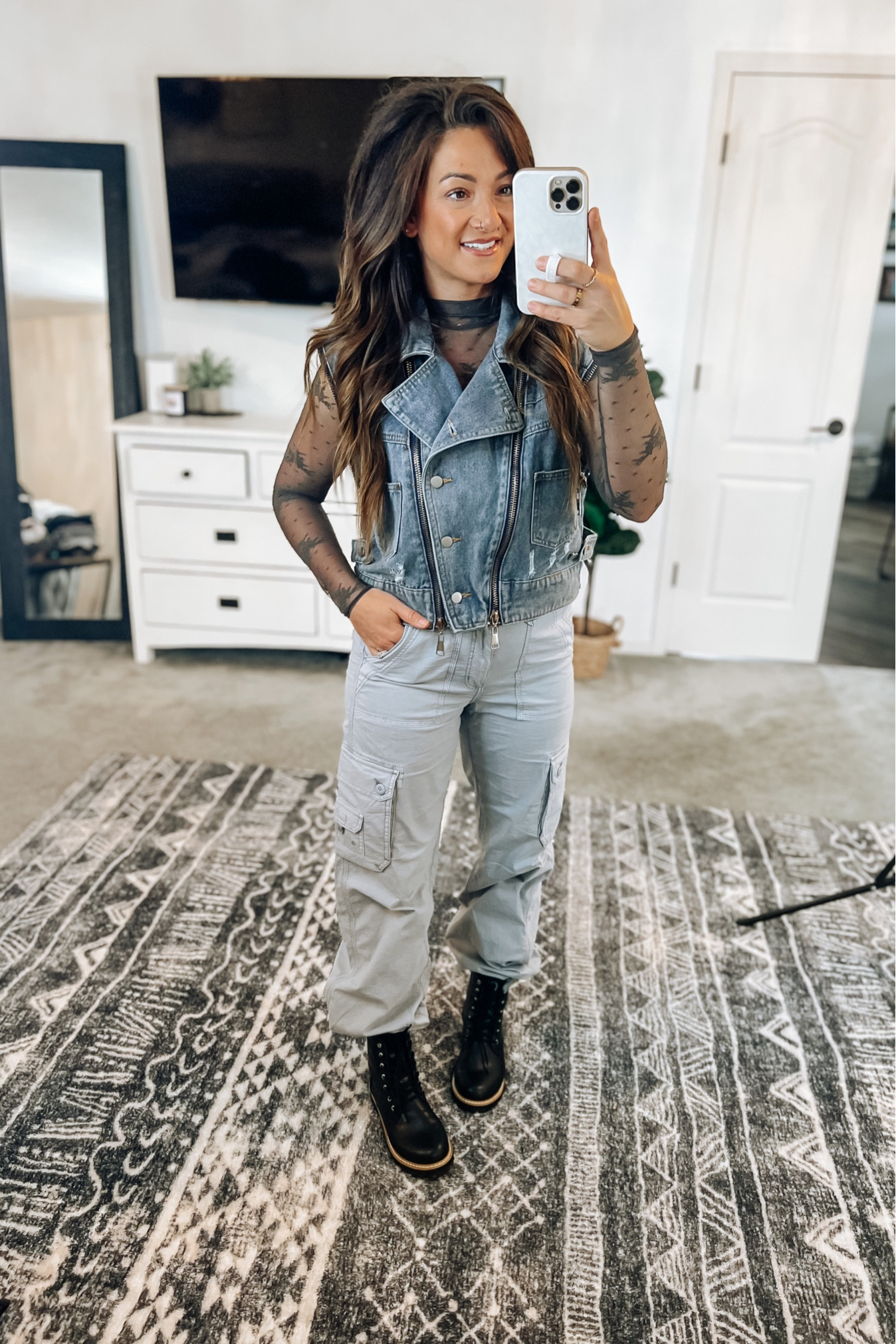 This oversized denim vest from Vici has removable sleeves and it’s actually the cutest denim jacket!! Grab it at 30% off during the LTK sale! 9/21-9/24! Boots also 30% off with code! Very true to size, if between or wider footed, size up. My aerie lace top and cargos are 25% off during the sale! Both tts. Linking other super cute cargos available too! 

#LTKSale #LTKstyletip #LTKsalealert