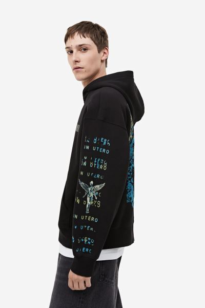Oversized capuchonsweater met print - Zwart/Nirvana - HEREN | H&M NL | H&M (DE, AT, CH, NL, FI)