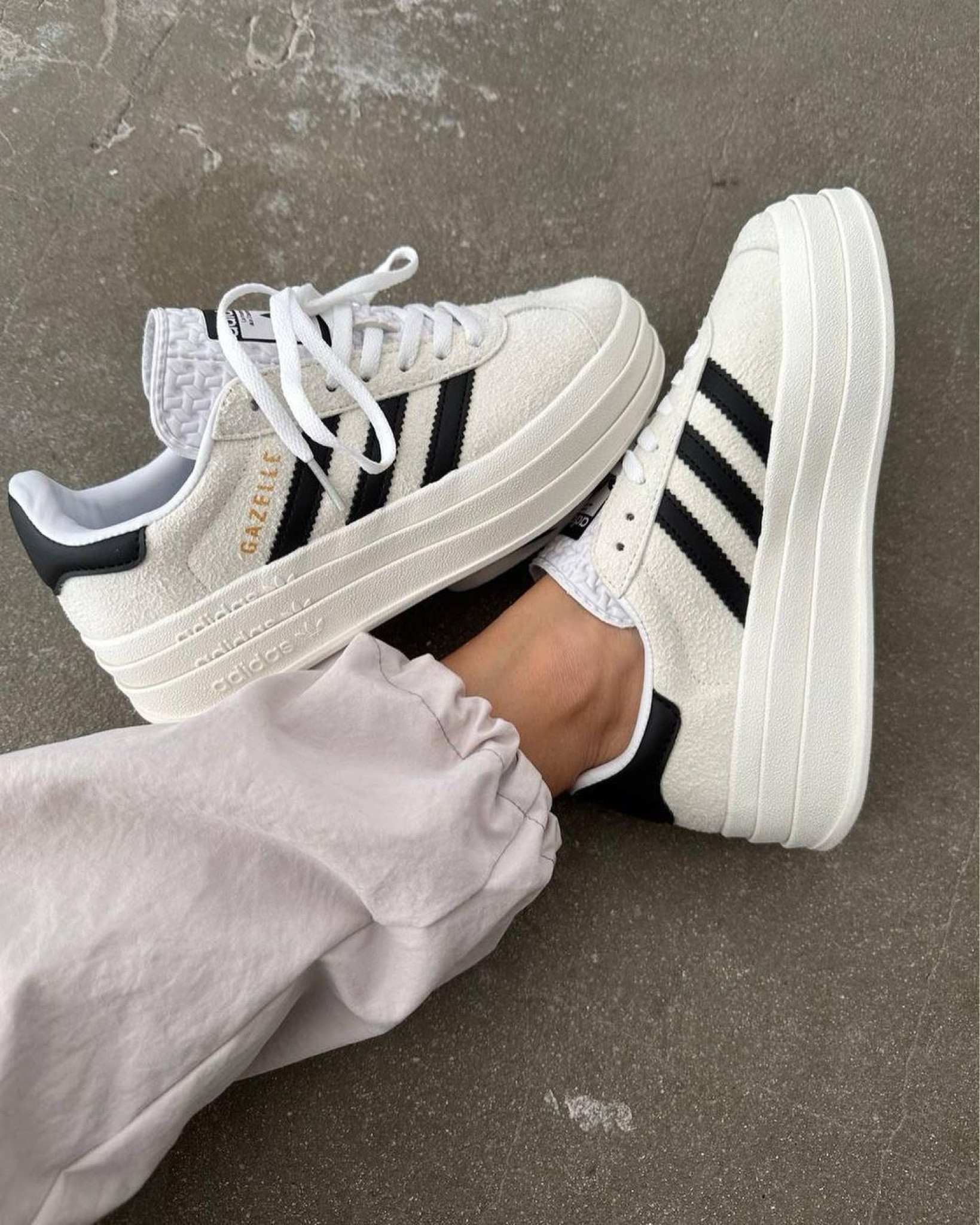 The cutest shoes! Perfect Christmas gift for girls! 

It wouldn't be a list of adidas' most iconic shoes without the Gazelle. First worn on indoor courts in the '70s, the suede shoe is gaining new fans to this day. Now the style you covet is lifted up to new heights. It's stacked three layers high, for a new perspective on the classic style. The details stay sporty with buttery-soft suede and serrated 3-Stripes. A metallic-gold "Gazelle" is the final stamp of our heritage. 

Sneakers, casual shoes, casual outfits, Christmas gifts for girls, Christmas gifts for sister, Christmas gift for mom, Christmas gift for girlfriend. 

#LTKstyletip #LTKgiftguide #LTKfitness