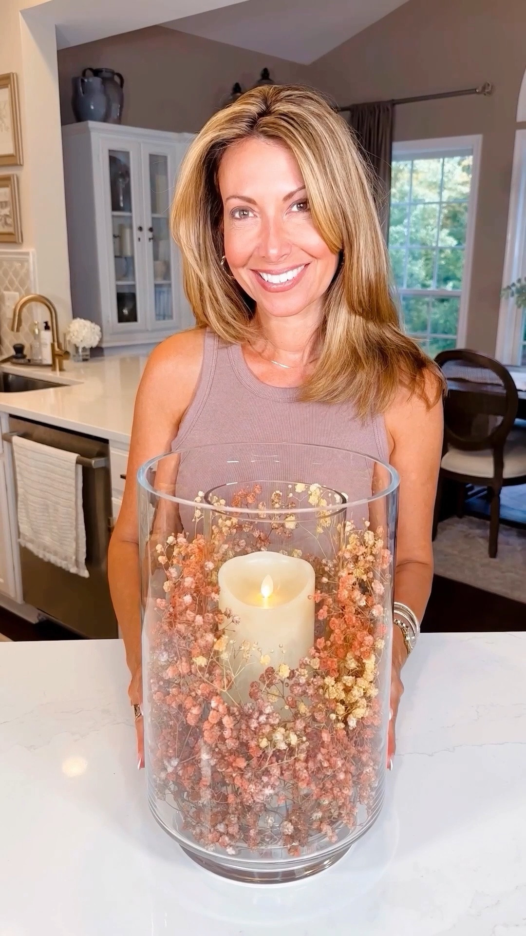 Fall-Colored Baby’s Breath Candle Centerpiece 🍂✨so simple, stunning! I spray-painted baby’s breath in warm autumn tones to create this delicate, dreamy candle centerpiece. It’s a beautiful way to bring in a natural, seasonal feel—without needing actual fall leaves just yet.

Perfect for early autumn tablescapes, Halloween parties, weddings, or just giving your space that soft, romantic fall touch—now and later.

#LTKHome #LTKSeasonal #LTKvlog