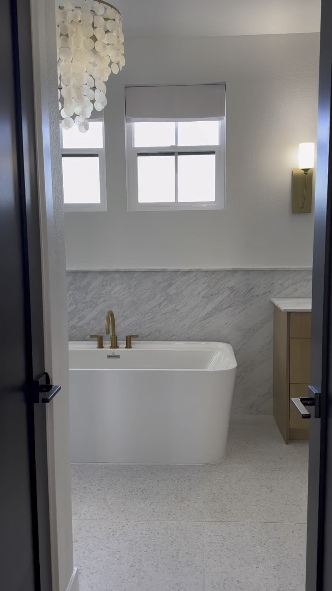 Bathroom details 
Tile 
Shower 
Modern
Organic 
Lighting 
Sconce 

#LTKhome #LTKstyletip #LTKVideo