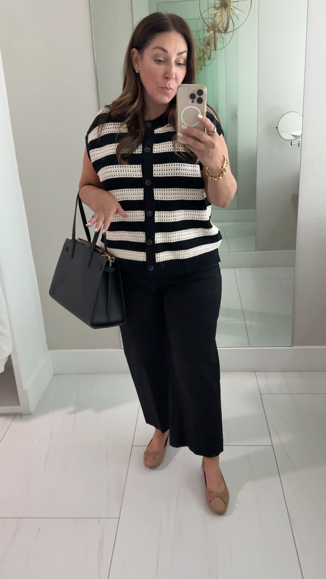 Summer workwear outfit wearing large in knit vest, 2XL in shaping tank and 2.5 (14/L) in pants