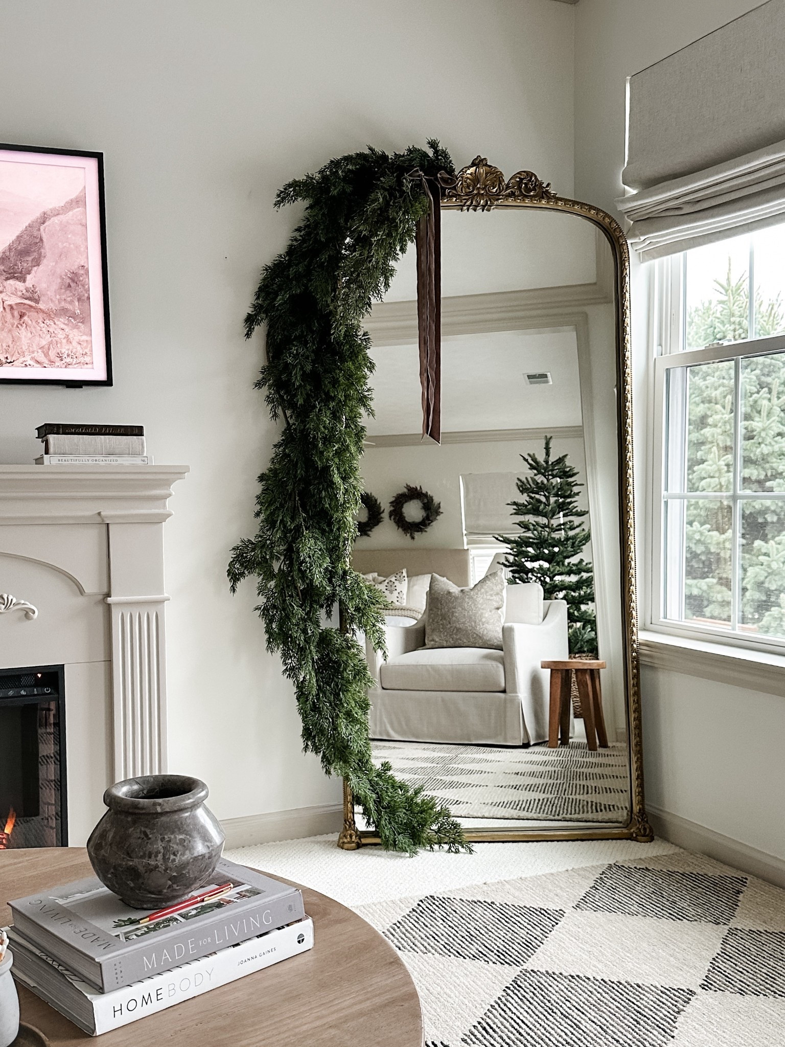 Mirrors get garland for Christmas. This is not up for debate. I used two cedar garlands and a couple of cedar picks to fill in the gaps here. 

#LTKHome #LTKHoliday #LTKSeasonal