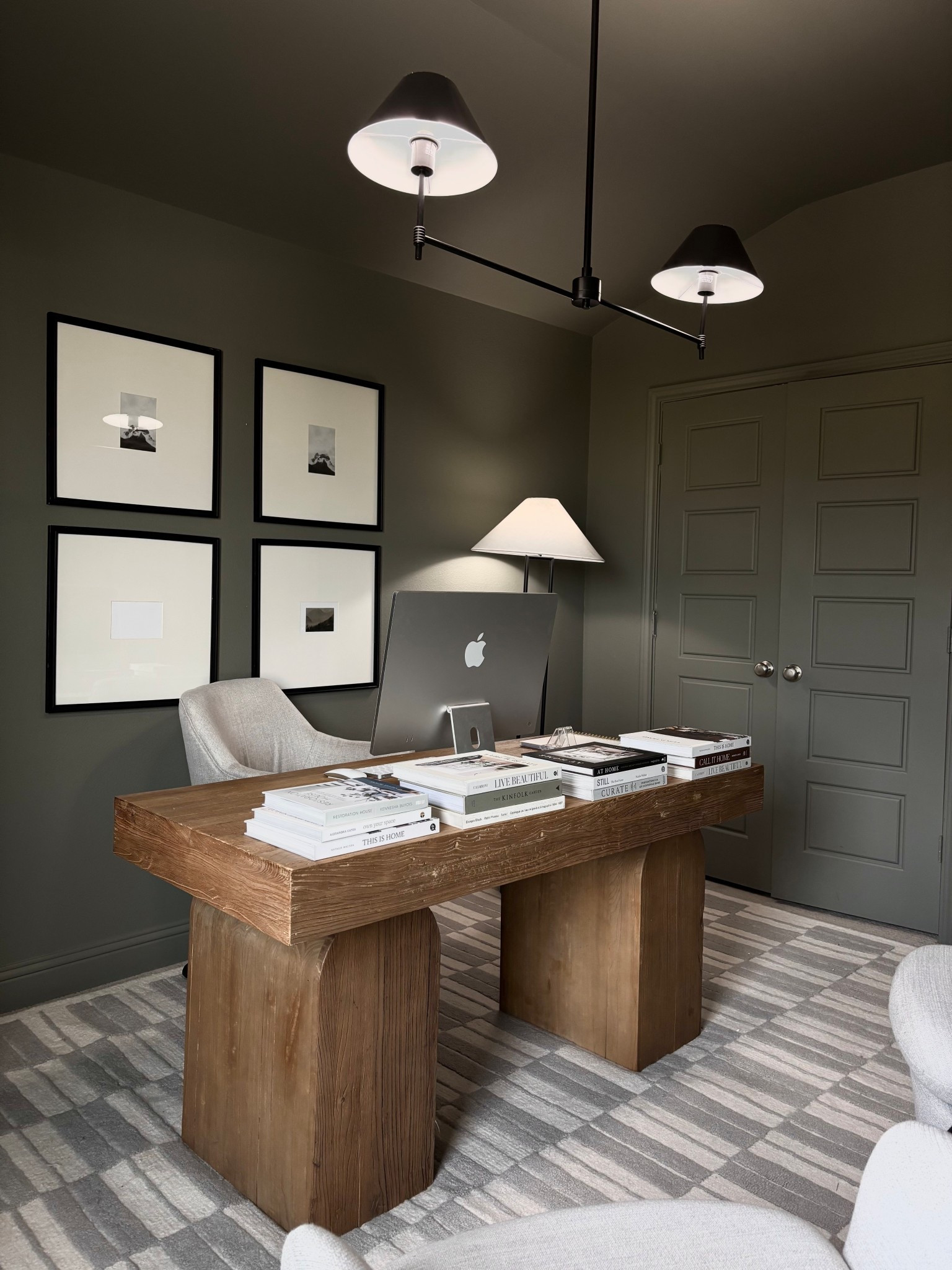 The current set up of my office! I added a rug, and I really love how much cozier it feels already! 

My rug is the size: 8x10. The coloring is grey, but it does look blue-grey in some lightings. 

My lamp was final sale from world market, so they do not sell online - only in store, but I linked some comparables!

And my accent chairs are from article.com. 

I do still to fill the frames! 🙈 #homeoffice #officedecor #officespace

#LTKdayinmylife #LTKHome #LTKSaleAlert