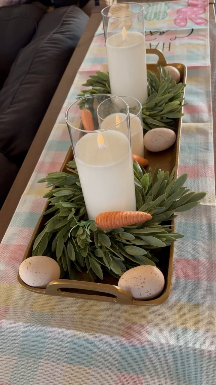 Let’s make an Easter centerpiece using Ashley Furniture’s Posy Tray! I love how this literally took less than 5 minutes to set up! Items needed:
-a tray
- two mini wreaths
- plastic eggs 
- fake carrots 
- 3 candles 
Let me know if you try this idea! 🐰🩷
•
•
•


#LTKhome #LTKSeasonal #LTKparties
