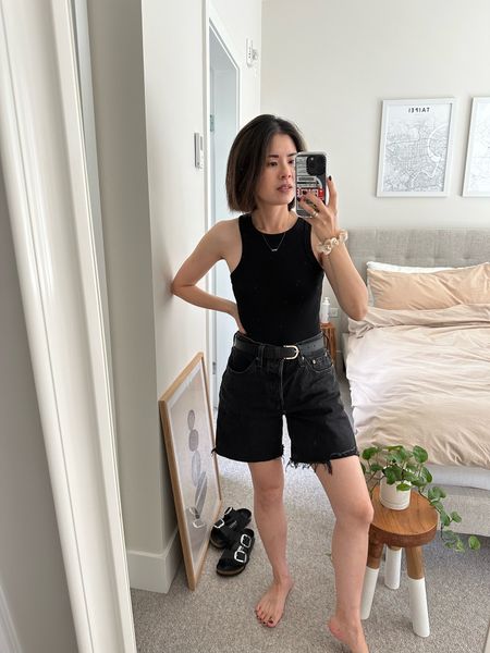 Tank: Amazon find. I’m in S
Shorts: Levi’s. I recommend size up for casual vibe and comfort 
Slides: Birkenstock. Tts

Black denim shorts. All black outfit. Casual outfit 
