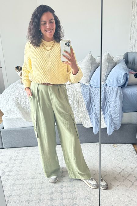 Spring picnic outfit! A pale yellow Vince sweater (size medium, old but linked similar) made more cropped with a Tucky then paired with gauzy Ramy Brook cargo trousers (size 12L, they run small in the waist). Cinched the pants with a belt from Amazon and paired with stacked gold necklaces and a fun pair of Madewell sneakers (size 11)   

#LTKSeasonal #LTKmidsize #LTKstyletip