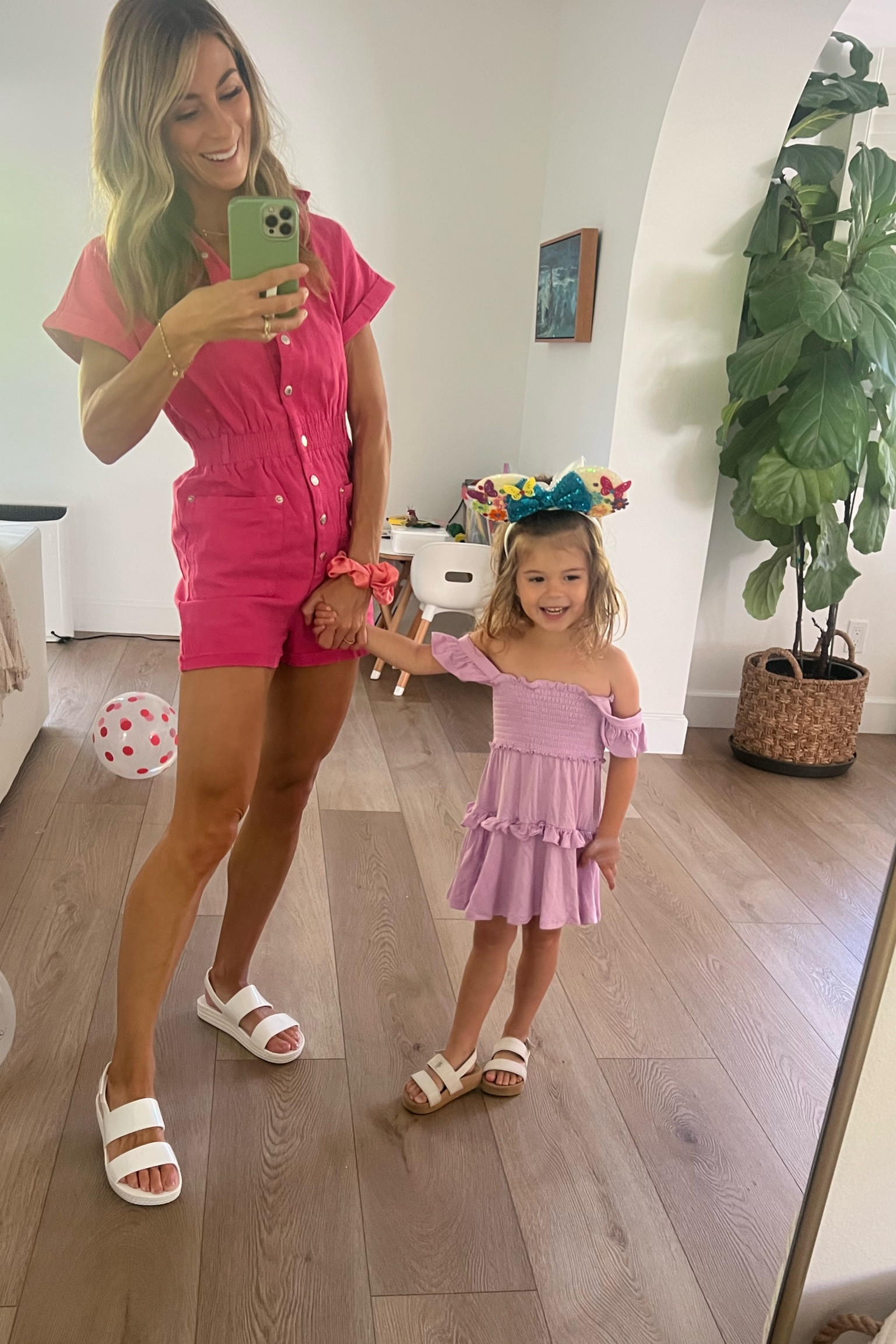 Off to Disney! Bright pink women’s utility romper. More the color of raspberry. Wearing XS, I’m 5’5” 
Toddler flutter sleeve dress is PoshPeanut  try RELL20 for 20% off posh peanut! 
Both of our shoes are reef! 

Reef sandals, pink romper, utility romper, back to school outfits, Disneyland outfit 

#LTKBacktoSchool #LTKfamily #LTKkids