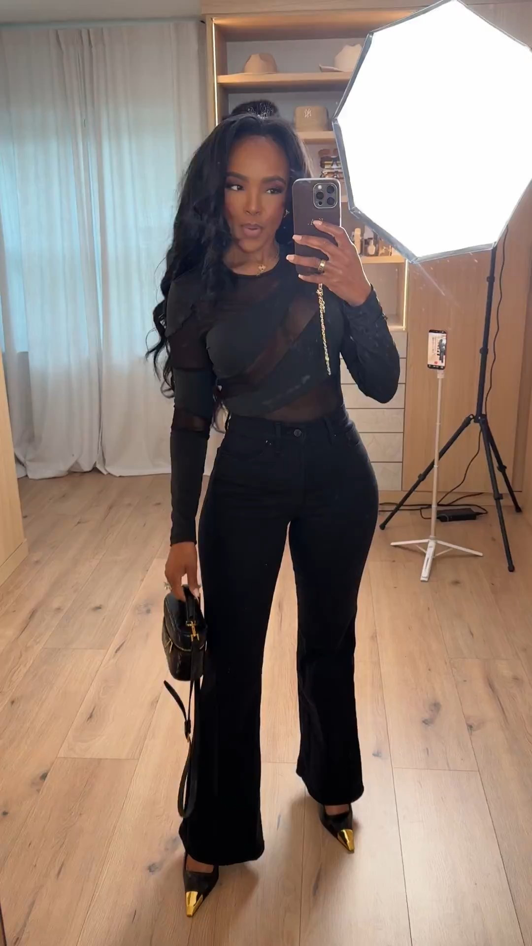 This all-black look is proof that simple can still be bold. The sheer detail adds just enough edge while the tailored pants keep everything balanced and flattering. It’s one of those outfits that instantly elevates your confidence the moment you put it on.

Each piece works hard in your wardrobe — style the top with denim or a skirt, and the pants with bodysuits or blazers. That’s how the cost per wear drops fast and makes this a smart long-term shopping strategy.

Perfect for date nights, dinners, girls’ night out, events, or anytime you want a confident, elevated vibe.

📏 Sizing & Fit Details  
Size Small  
Height: 5'4"  
Weight: 138 lbs  
Bust: 34D  
Waist: 27"  
Hips: 40"

Save this post to revisit later or tap to get details and shop this full look instantly.

Black outfit, sheer top outfit, black pants look, date night outfit, night out style, elevated basics, cost per wear wardrobe

Follow me on Instagram and YouTube @kirasfashionfinds



#LTKootd #LTKPetite