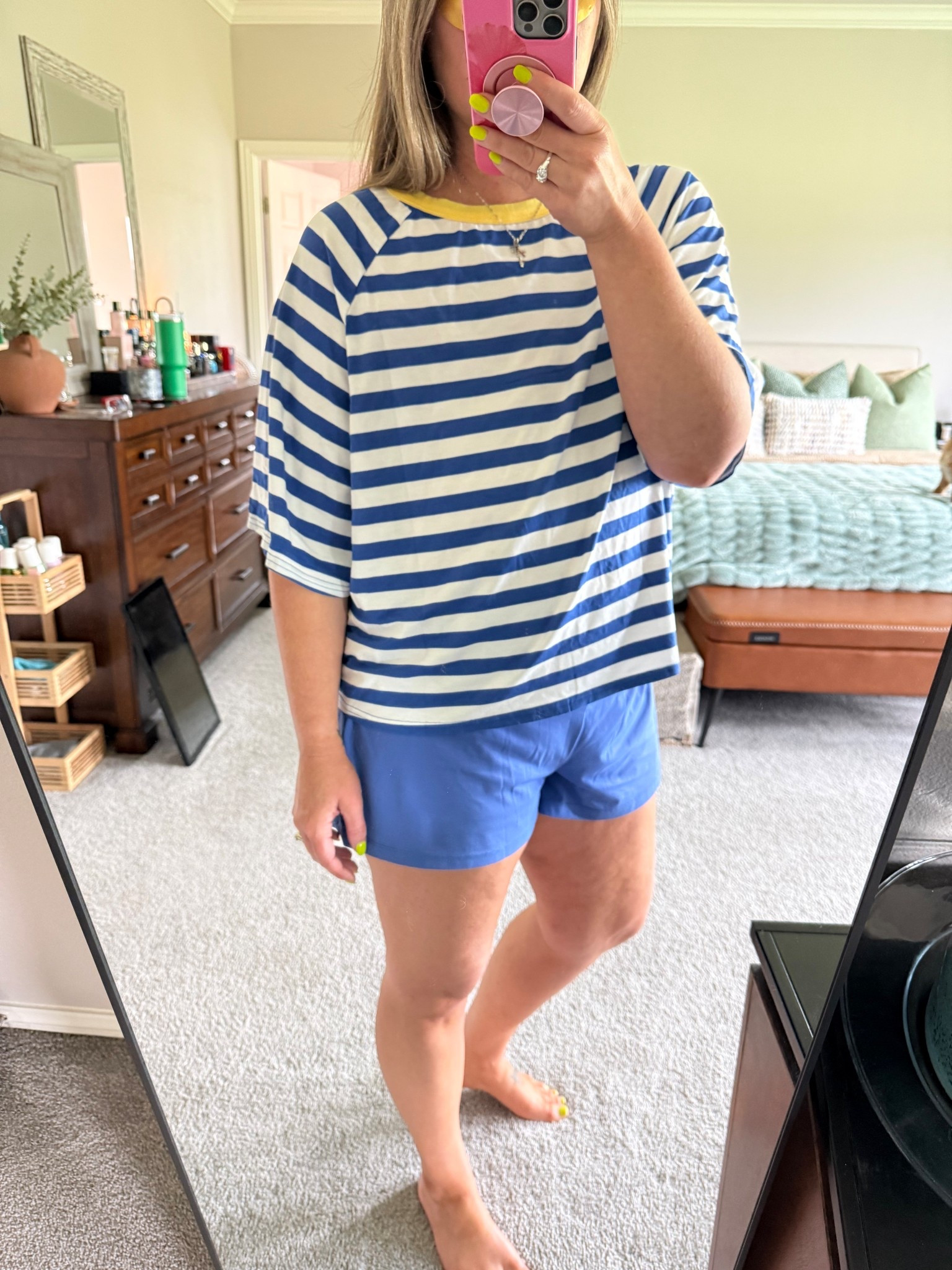 Yall will see me living in this outfit in multiple different color schemes all summer long. SO comfy! The perfect cropped but not cropped oversized tee with my fav 2 in 1 shorts from Halara 

#LTKootd #LTKOver40 #LTKMidsize
