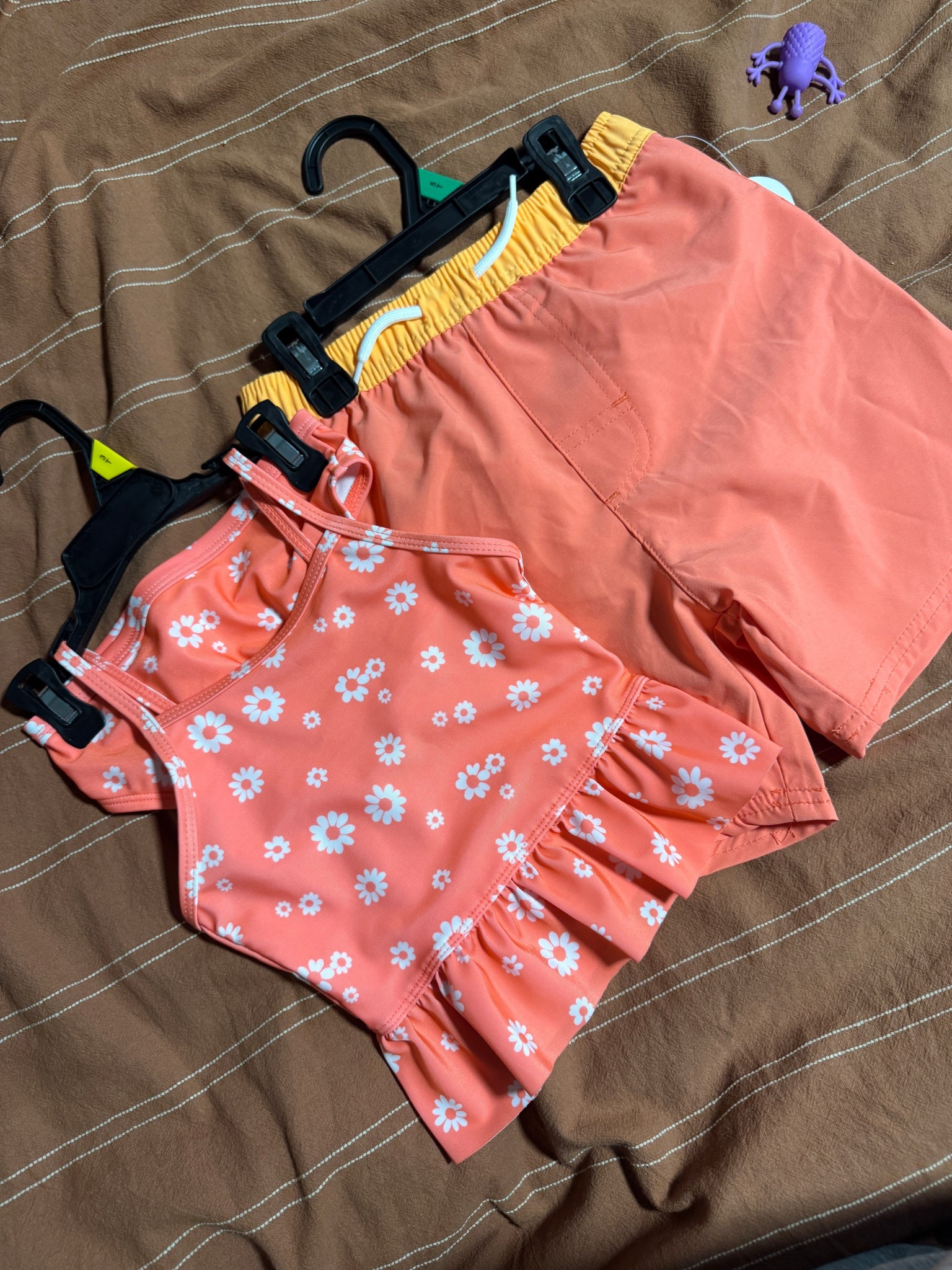 Only $6! Cute matching swimsuits for toddlers! Toddler Boy swimsuit and toddler girl swimsuits to match all summer long! I love that they are safe swimming colors, perfect for a beach outfit or pool outfit to more easily spot your kids in the water! 

#LTKBaby #LTKKids #LTKTravel
