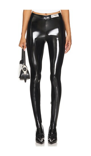 Black Vinyl Footed Leggings in Black | Revolve Clothing (Global)