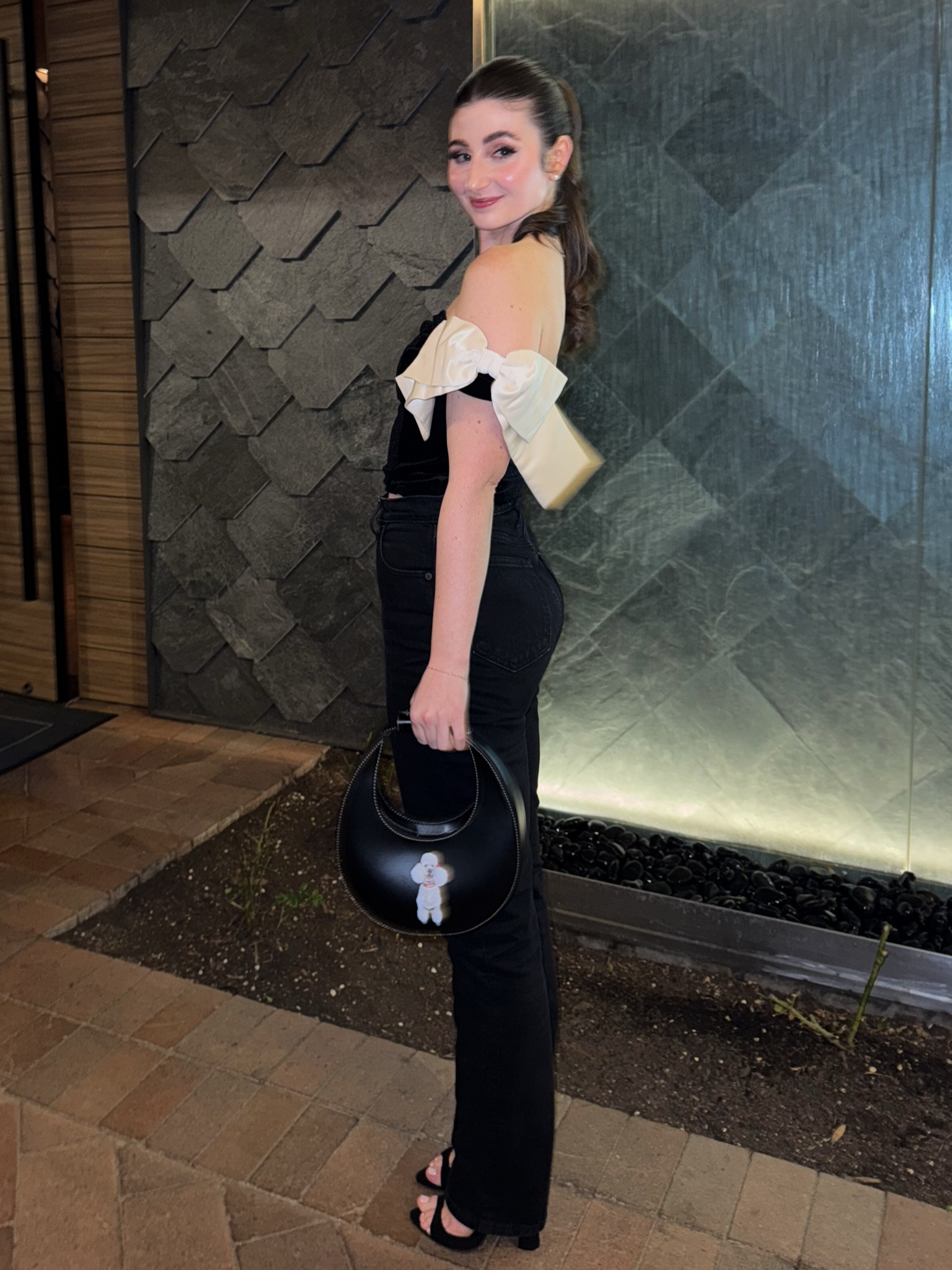 Date night outfit 

Bow top 
Custom bag , pet bag 
Black jeans 
Black heels , staud moon bag , French connection 

#LTKStyleTip #LTKItBag #LTKPetite