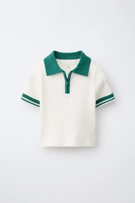 Polo shirt with a contrast shirt collar and short sleeves. Front zip fastening. Features stripe d... | Zara US