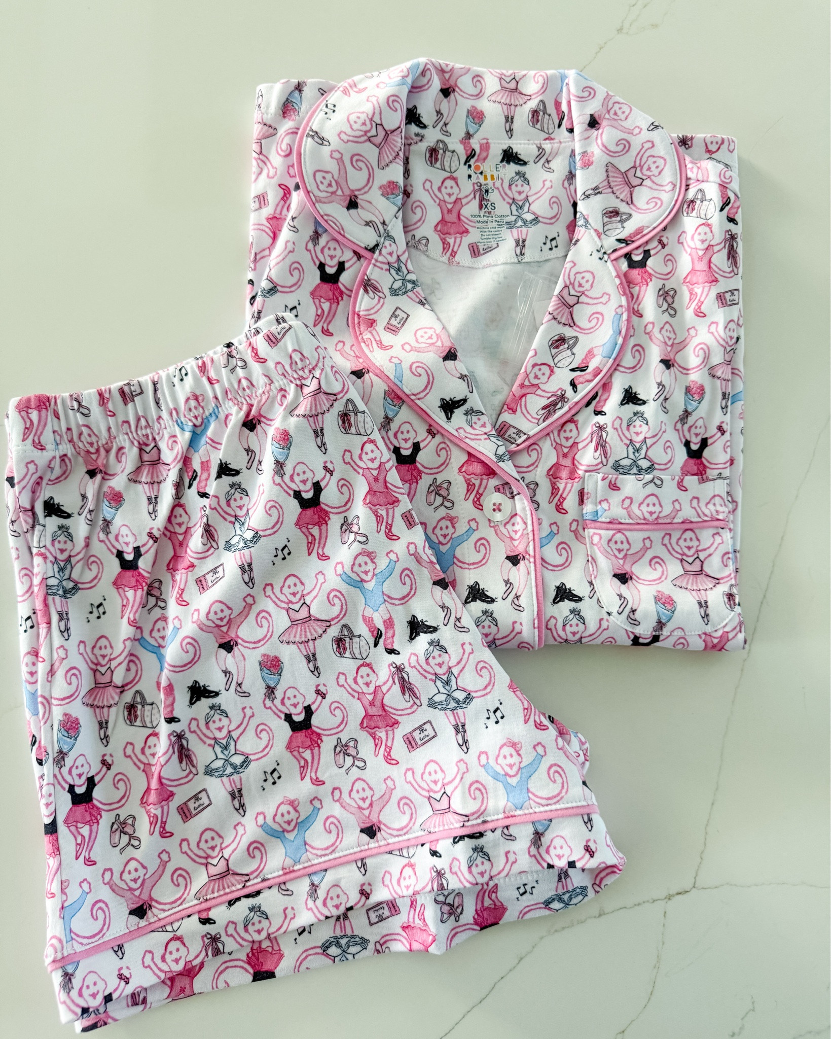 Dance season has already started in our house with choreo practices and Nutcracker auditions.  When I spied these Monkey Pirouette Polo Pajamas from Roller Rabbit I just had to grab them for my own dancing queen.

#LTKgrwm #LTKSeasonal #LTKKids