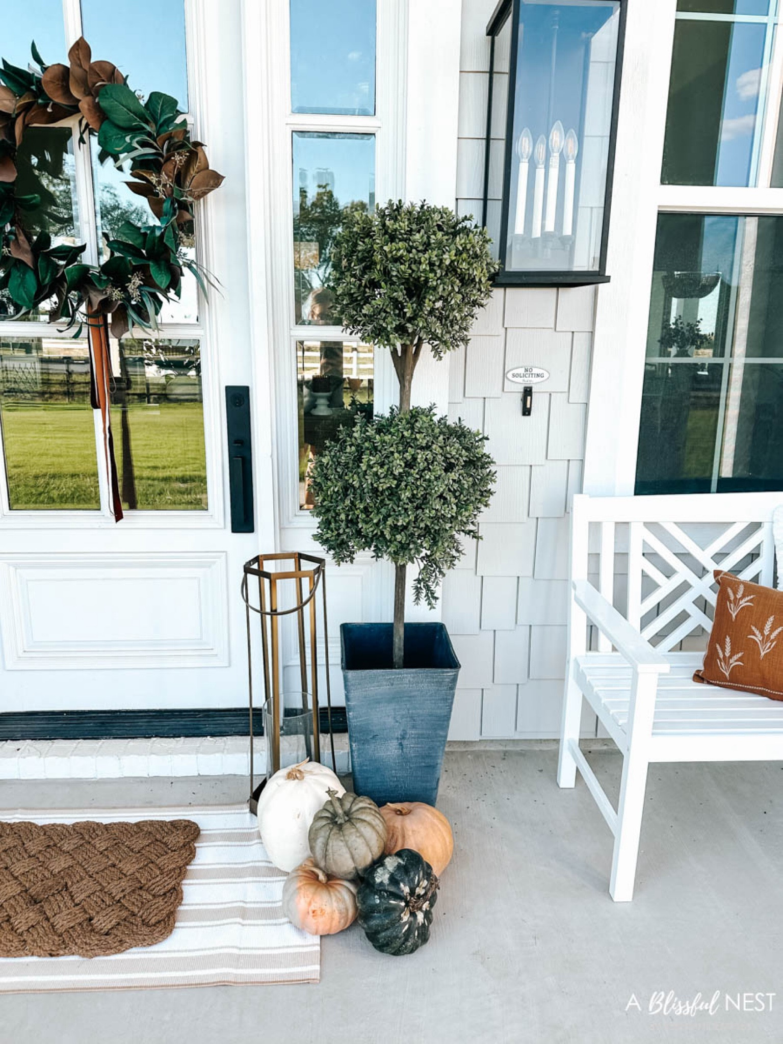 Fall porch details. 

Faux topiary, faux pumpkins, magnolia wreath, outdoor benches, Target finds, Walmart finds. 



#LTKFindsUnder100 #LTKSeasonal #LTKHome