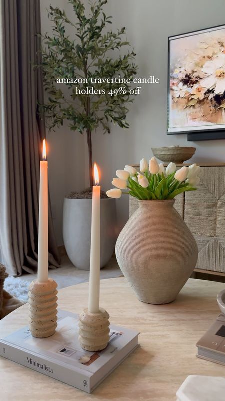 amazon travertine candle holders are 49% off! 

coffee table styling. Coffee table decor. Organic modern home decor. Faux tulips. Vase , storage cabinet, faux olive tree, planter 

#LTKhome #LTKsalealert #LTKVideo