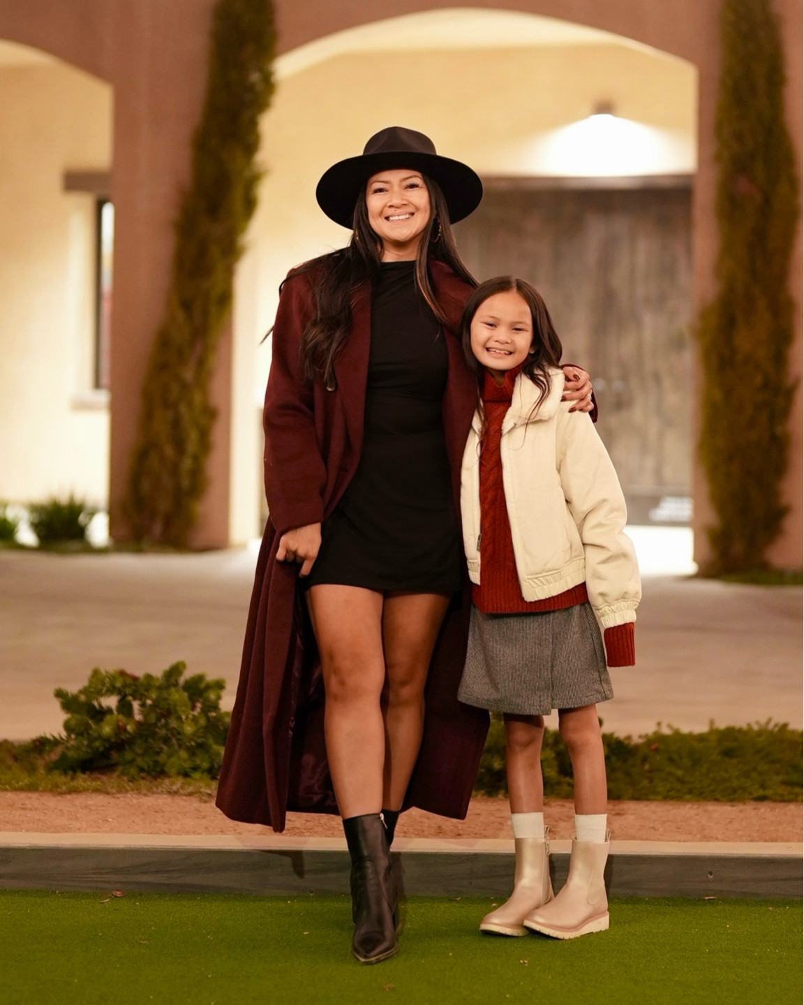 Family photo inspiration with our favorite Fall fashion color burgundy. Loving this warm coat with a mock neck mini dress and boots. Daughter is wearing a cozy turtle neck layered with bomber jacket and plaid skort. All from Abercrombie Kids.  

#LTKFamily #LTKKids #LTKHoliday