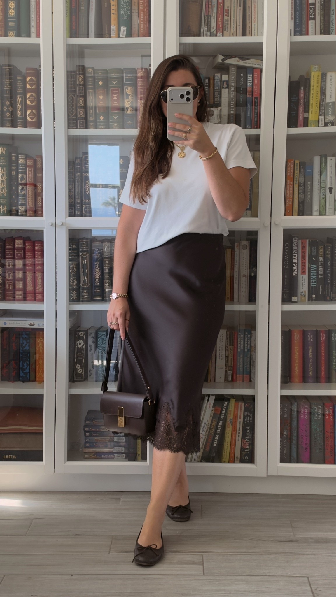 Look du Jour 🤎

Outfit details: 
Top: COS
Skirt: @Aritzia 
Flats: @Margaux 
Bag: @ATELIERS AUGUSTE 
Glasses: Warby Parker, I’ve been loving this clip on feature for my regular glasses so I can easily transition! 
Jewelry: Agatha Paris, unable to link here but you can find in my ShopMy under ‘Shop the Looks’ 

With Amour, M.