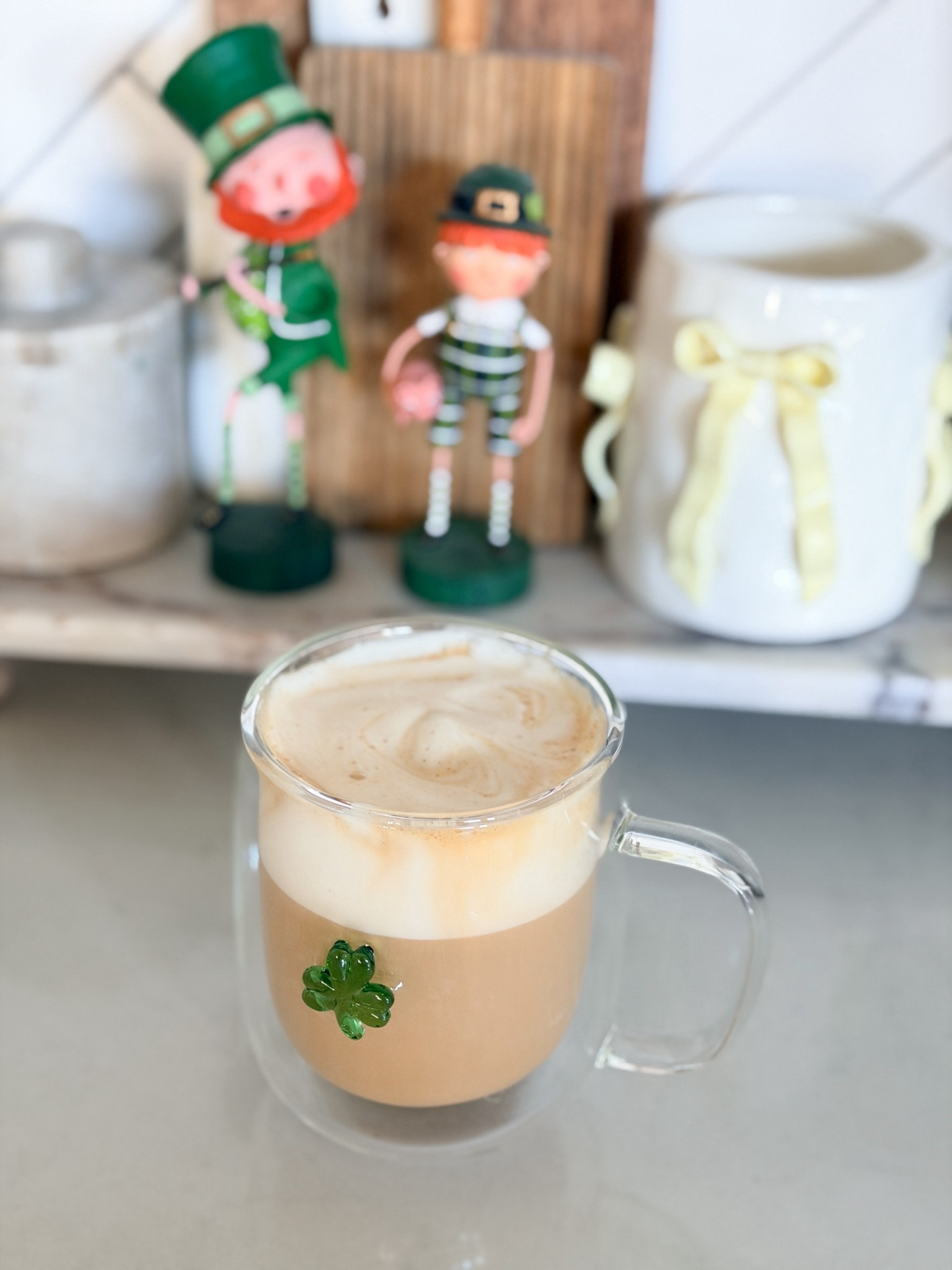 March mornings are hitting different with this setup. Caramel Cookie Nespresso pod, Chobani Sweet Cream foam piled on top, all in my Williams Sonoma Clover Icon mug with the little leprechauns approving from the background. Honestly could not have planned a more St. Patrick’s Day-ready coffee moment if I tried. The double-wall glass keeps everything at the perfect temperature while still showing off all that gorgeous foam layering. This is the kind of morning that makes getting out of bed worth it. Linked in my LTK! @Williams-Sonoma 

williams sonoma mug-clover icon mug-double wall glass mug-st patricks day coffee-st patricks day morning-march coffee-seasonal coffee-nespresso latte-caramel cookie nespresso-chobani sweet cream foam-coffee foam-sweet cream latte-homemade latte-coffee at home-espresso at home-morning coffee-coffee aesthetic-cozy morning-coffee bar-home coffee bar-kitchen finds-williams sonoma kitchen-williams sonoma finds-coffee lover-barista at home-easy latte-pod coffee-nespresso capsules-st patricks day decor-spring decor-seasonal decor-leprechaun decor-holiday home decor-green aesthetic-clover-lucky-march finds-everyday luxury​​​​​​​​​​​​​​​​

#LTKmorningroutine #LTKfoodie #LTKHome