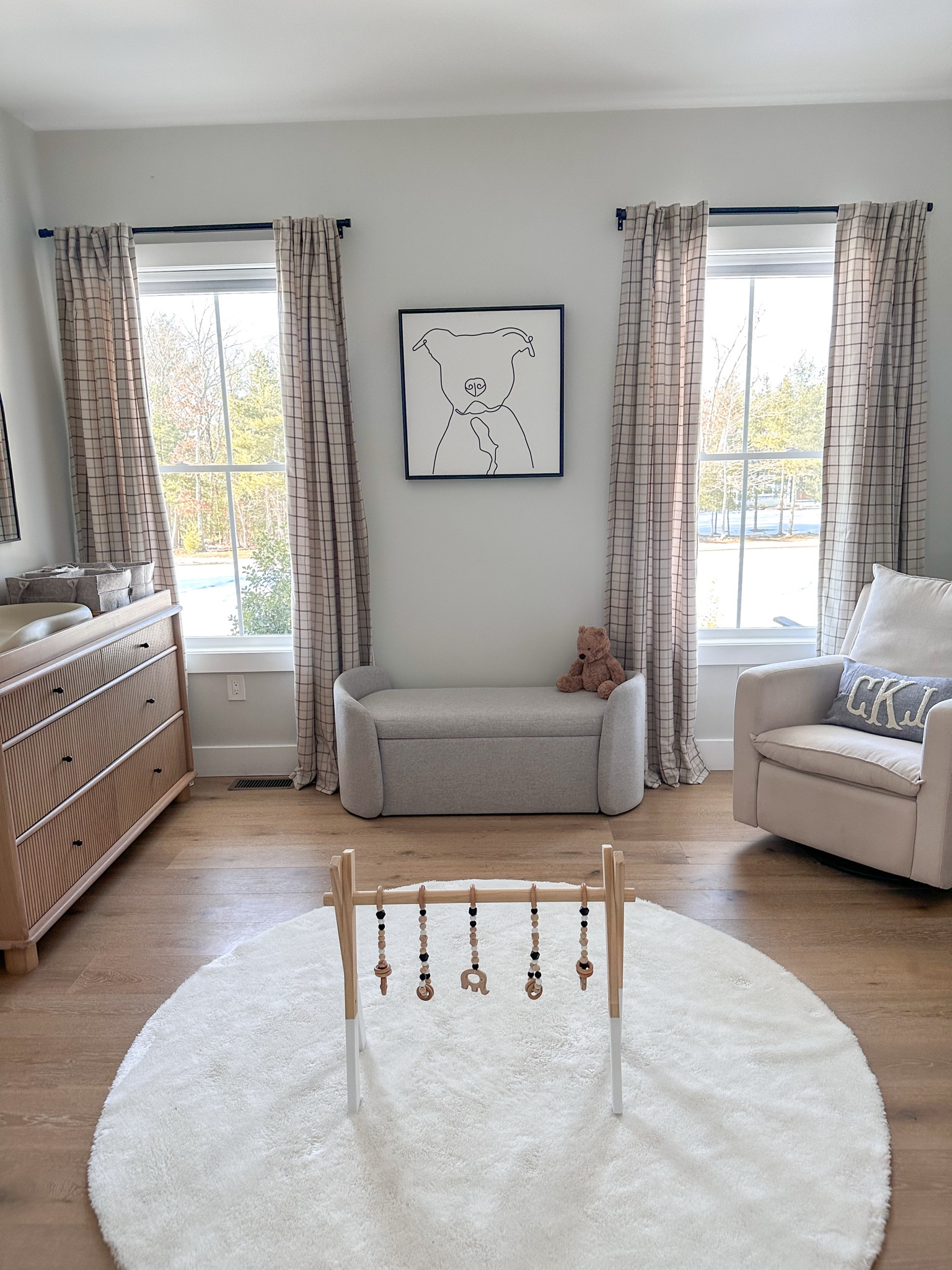Baby boys neutral  nursery 🧸

• west elm, amazon finds, Etsy finds, baby room, plaid curtains, glider chair, changing table, washable rug, storage bench, custom details

#LTKBaby #LTKHome #LTKKids