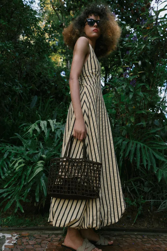 Braided mini tote bag. Features a removable interior compartment with a drawstring closure. Twin ... | Zara FR