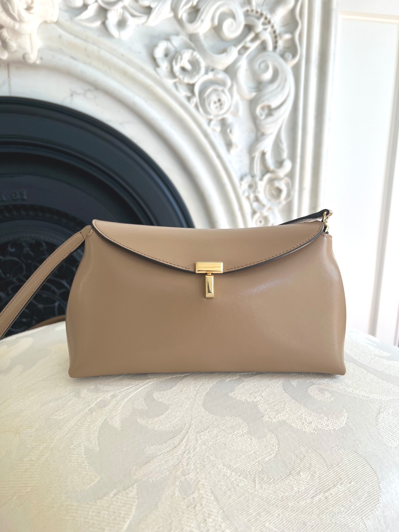 TOTEME t-lock clutch is my go-to mom bag and a quiet luxury find. You can use as crossbody or as a clutch. So many fashion editors have it. A good under $1000 bag! Also linking a look for less  

#LTKItBag #LTKStyleTip

#LTKItBag #LTKStyleTip