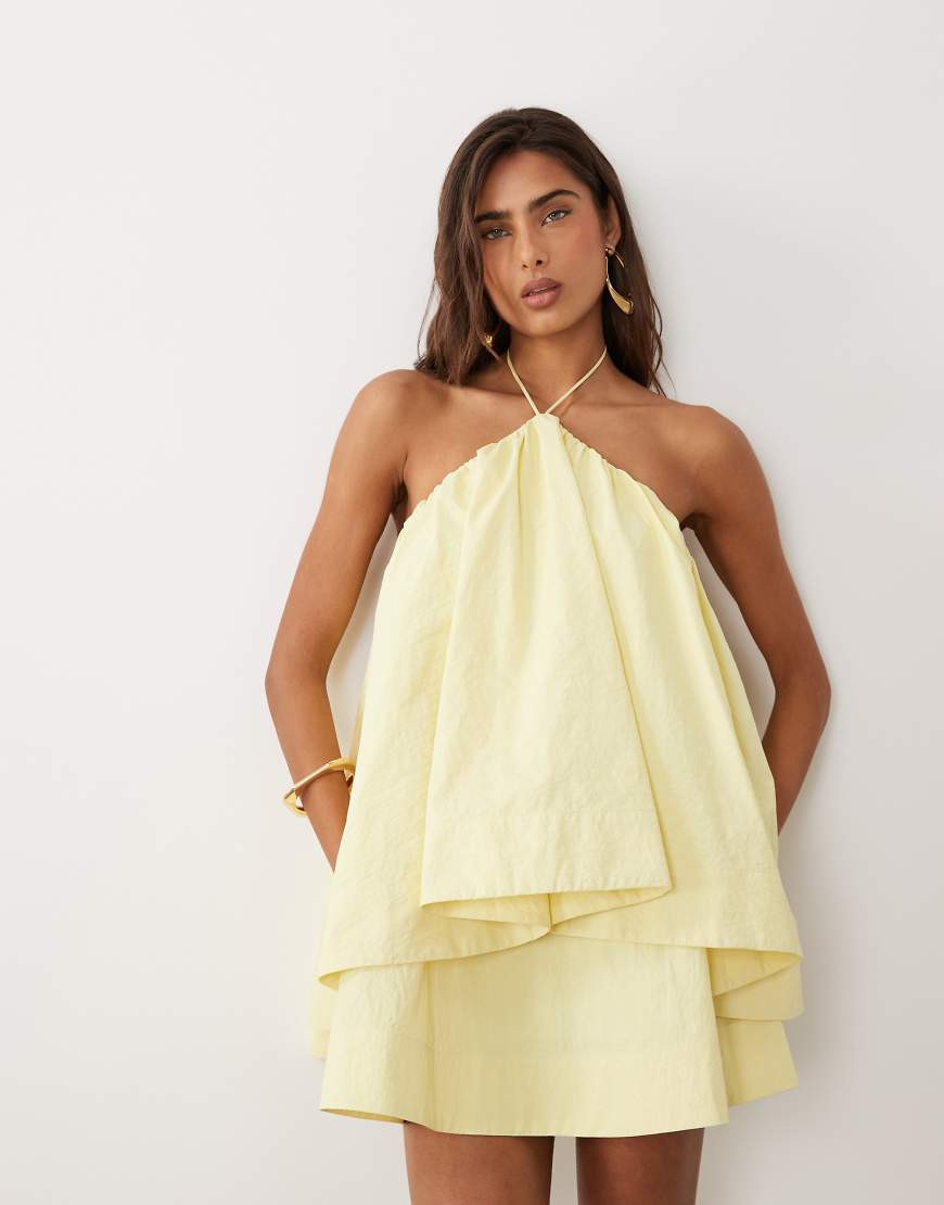 ASOS DESIGN halter neck trapeze mini dress in soft yellow | ASOS (Global)