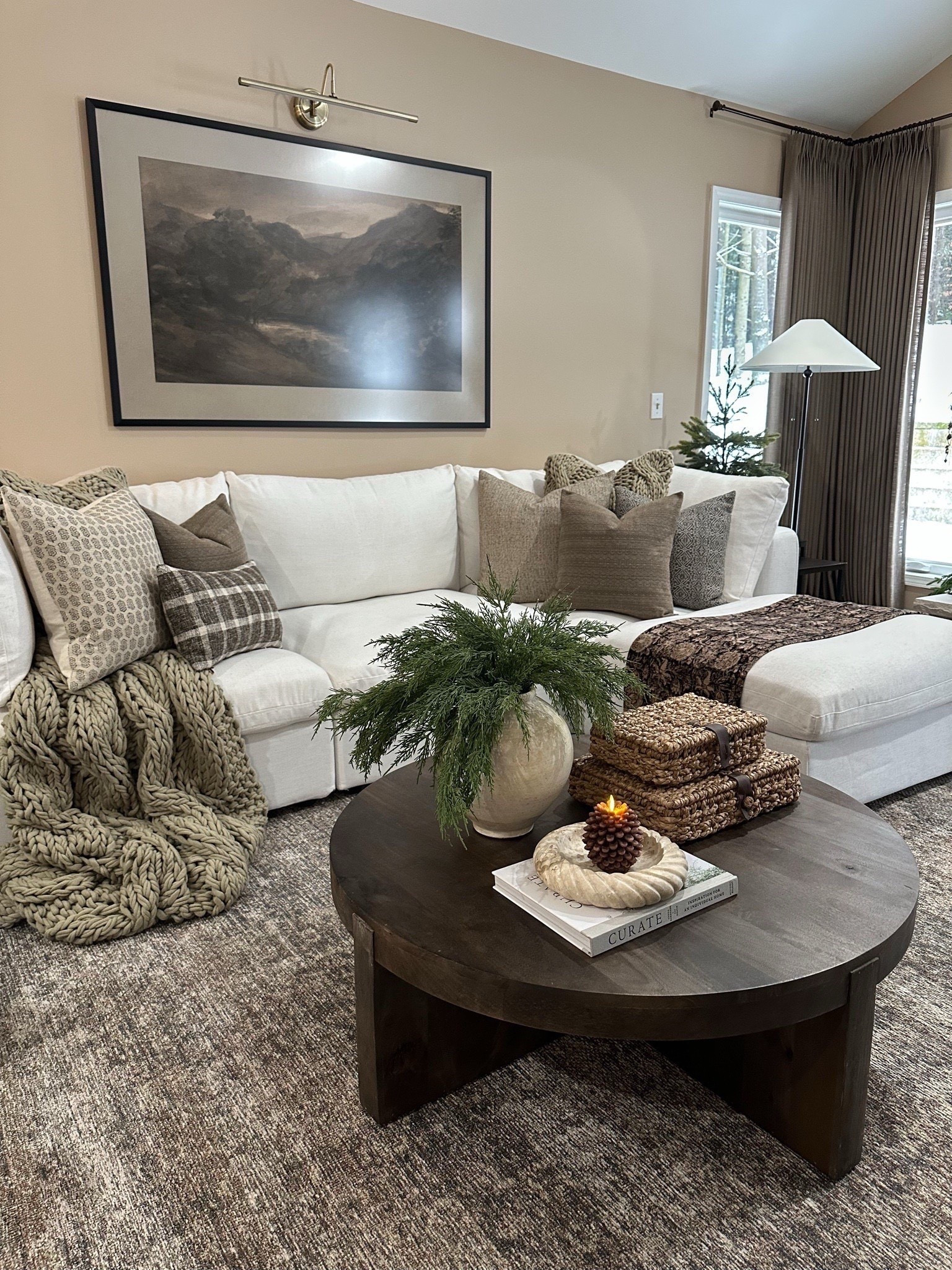 Neutral Cozy Living Room with Amazon Modular Sectional.

Follow @farmtotablecreations on Instagram for more designer-inspired home styling and Amazon decor finds.

This space proves you can achieve a high-end look with affordable pieces. The beautiful & super cozy modular sectional is from Amazon — plush, comfortable, and the perfect neutral base for layering textures and tones. Styled with cozy knit throws, tonal pillows, woven accents, and a dark wood coffee table, it creates a warm, modern-organic living room that feels timeless and inviting.

#amazonfinds #amazonhome #sectional #livingroomdecor #neutraldecor #modernorganic #coffeetabledecor #pillows #rugs #throwblanket #homedecor #interiordesign 



#LTKHoliday #LTKHome #LTKSaleAlert