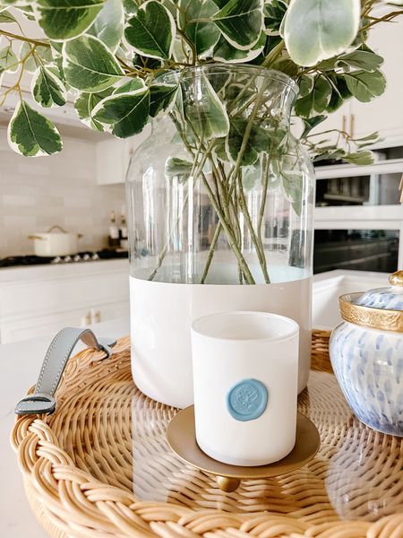 Spring to Summer tray styling - all of the blooms have fallen from the blossom trees around our town so came down my stems in the kitchen. I got new greenery for the vase to make an easy spring to summer transition when the time comes and my new tray came in the braided detail is so beautiful. Comment LINKS for a link sent to your DMs. 

#LTKSeasonal #LTKhome