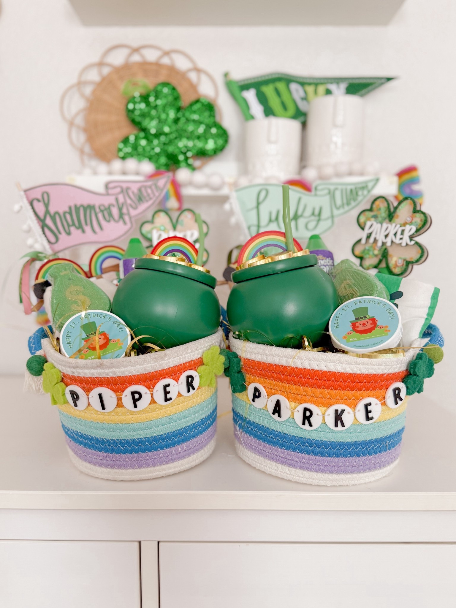 St. Patrick’s Day pot of gold baskets! 🌈☘️✨ 

Play dough is Young Wild and Friedman. Shaker wands, flags, and name tags are from Goldie Letter Co

#LTKSeasonal #LTKmomlife #LTKKids
