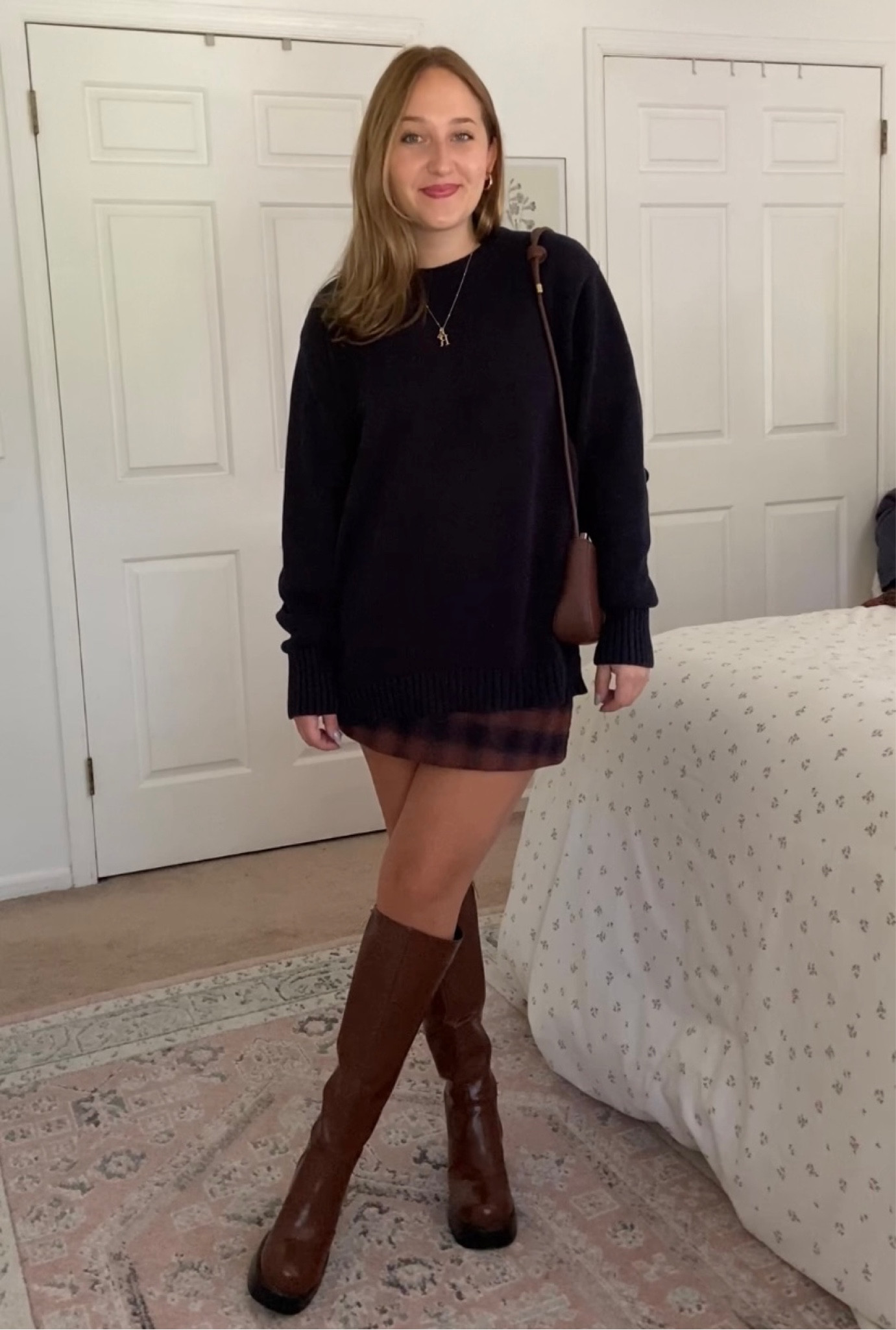 sweater is briana sweater in navy from brandy melville site. skirt is aritzia!
