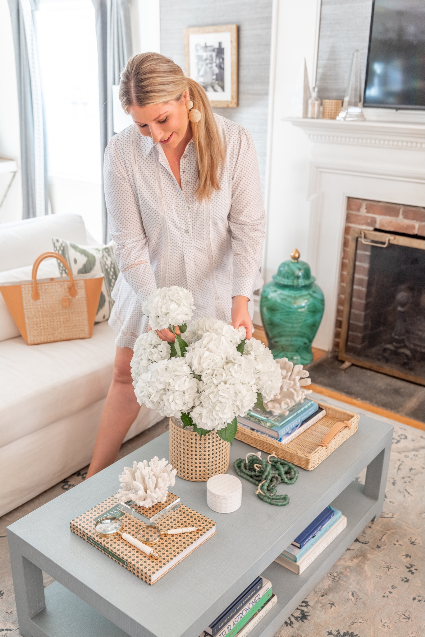 Living room decor 🫶 cane vases, Serena and Lily, coffee table, blue coffee table, coffee table books, wicker tray, mark and Graham, Tuckernuck, white shirt dress, shirtdress, raffia earrings, white slipcovered sofa, pottery barn sofa

#LTKFind #LTKhome #LTKstyletip