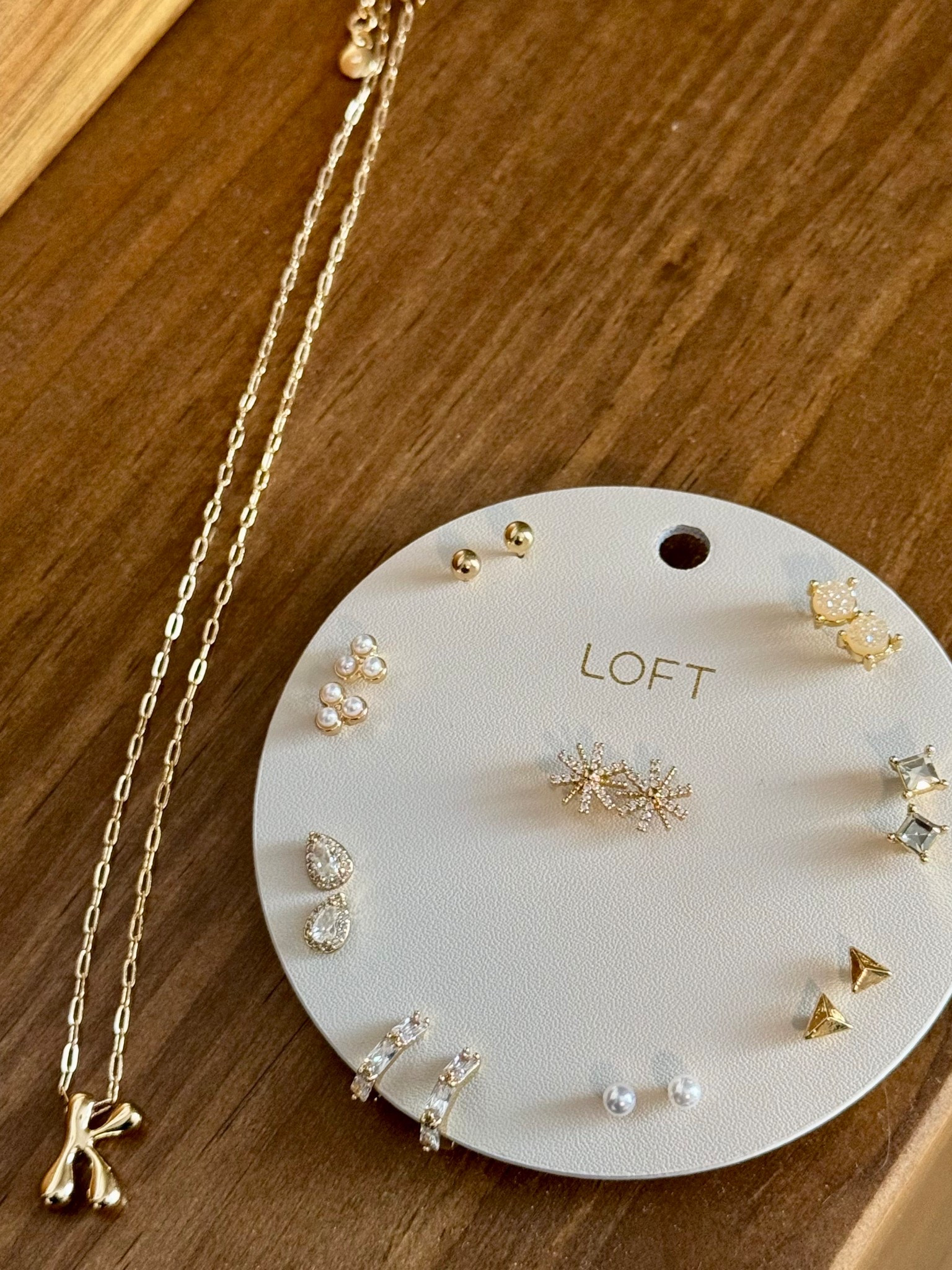 Love this earring set! I’ve been adding these tiny studs to my double piercing! And the bubble initial necklace for this price, can’t beat it. 

#LTKGiftGuide #LTKSeasonal