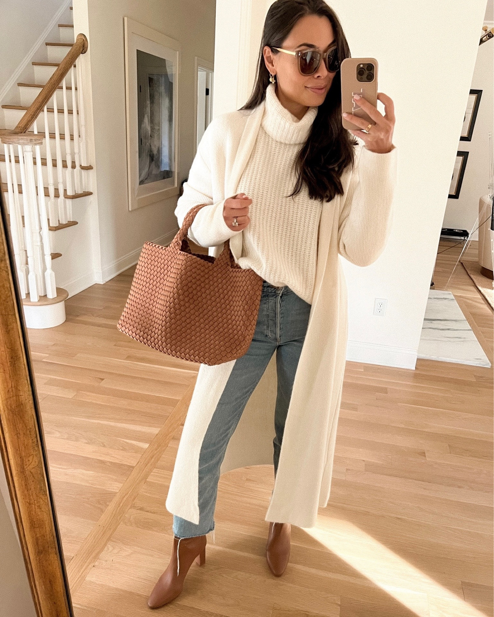 Kat Jamieson of With Love From Kat wears a casual look. Long cardigan, turtleneck sweater, leather booties, work tote.

#LTKSeasonal #LTKstyletip