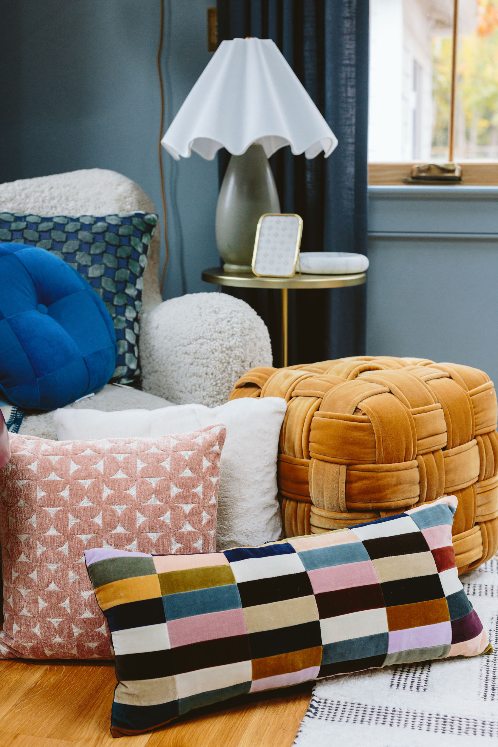 I don’t know what I love more – that incredible wavy lampshade on that green lamp – $70!!!!! FOR BOTH!!! Or that really good oxblood dome lamp (splurgier, but very powerful and makes a fast statement in any room). The mustard velvet ottoman is in my home and pairs so pretty with my blue velvet chair. But the Schoolhouse blanket? Certainly a splurge but it’s so incredible – if you have a basic bed or sofa and you want to punch up your room – a pattern like this does it INSTANTLY. And don’t forget that Rejuvenation has incredible velvet pillows in really rich colors (and some neutrals) for those of you who don’t want a pattern).

I’m really into velvet apparently, as almost all of these pillows are – it’s just such a pretty texture in really rich colors. The round blue pillow – special and such a punch. The blue/green velvet pillow is also excellent (and the same pattern comes as curtains which look so expensive and custom – patterned curtains are so back, y’all).

#LTKHoliday #LTKGiftGuide #LTKCyberWeek