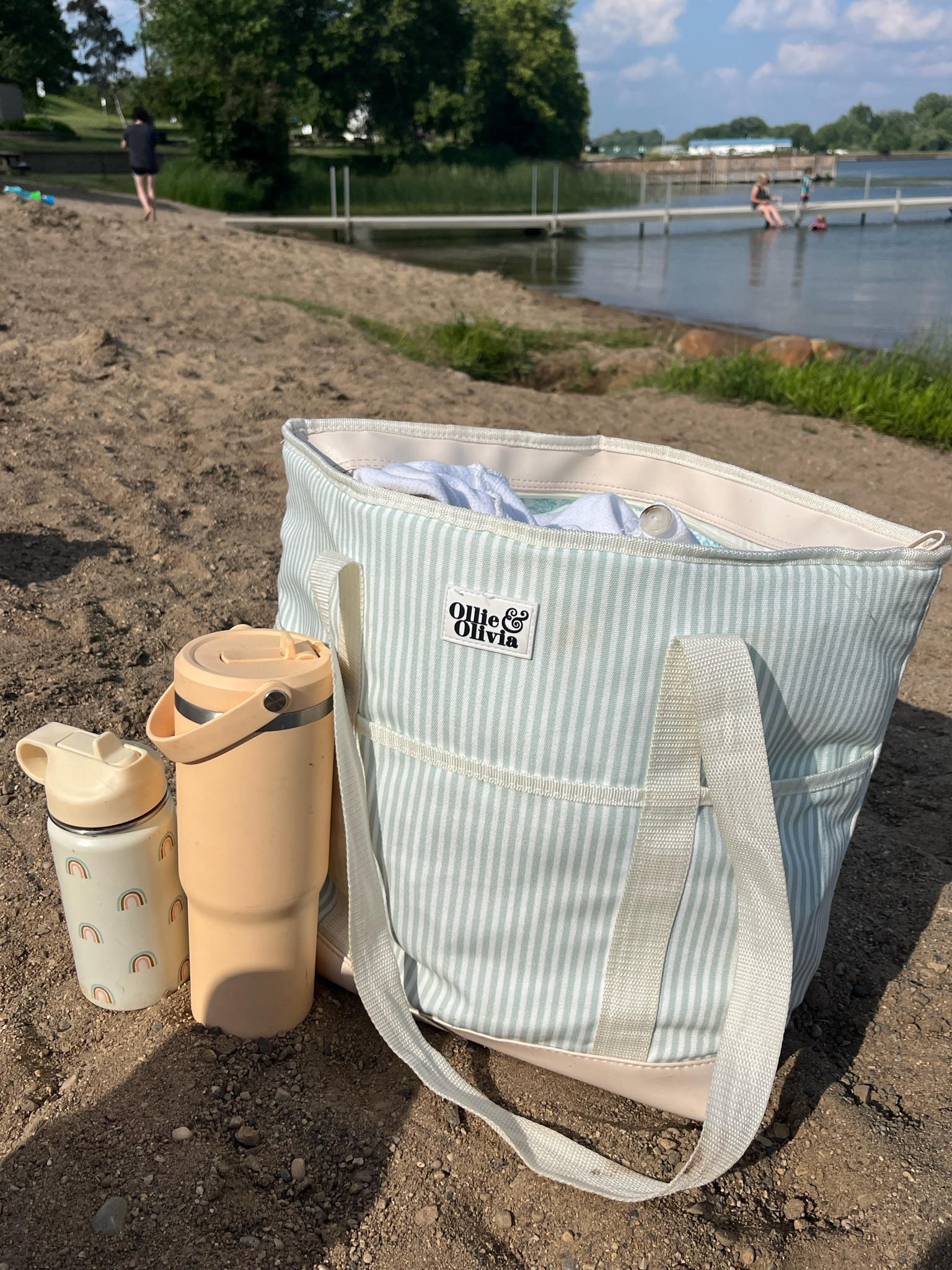 My beach day favorites! All affordable options. Striped beach tote that doubles as a cooler and zips closed on sale right now! Stanley 32oz flip cup tumbler dupe on Amazon (lots of colors!). Toddler & kids stainless tumbler on Amazon for $12.99! Also linked my snack bag set from Walmart. Vacation, beach, lake day finds. 

#LTKSeasonal #LTKunder50 #LTKkids