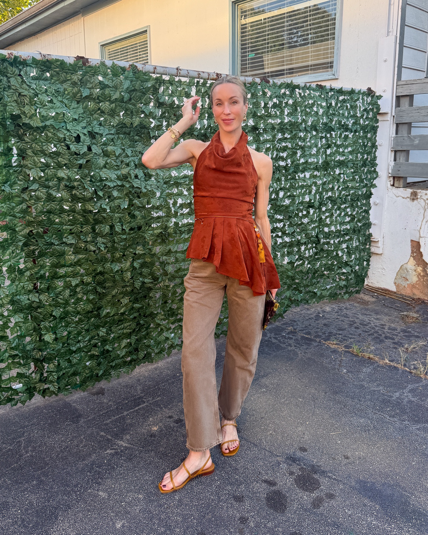 Casual date night! 🍁 S/2 halter, 25 jeans (full length, also linked similar and ankle length version), old @emmeparsons sandals, La Double J pouch, tassel necklace as belt (similar linked) 

fall night out, fall date night outfit, tan jeans, fall jeans, fall going out top, fall clutch, fall girls night outfit

#LTKgrwm #LTKootd #LTKSeasonal